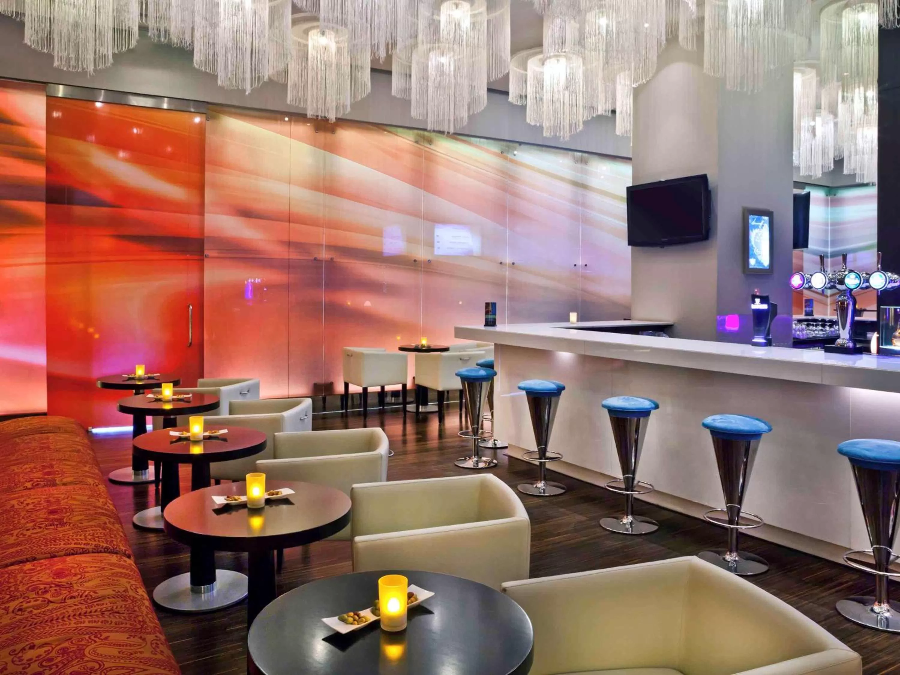 Lounge or bar in Novotel Suites Mall Avenue Dubai