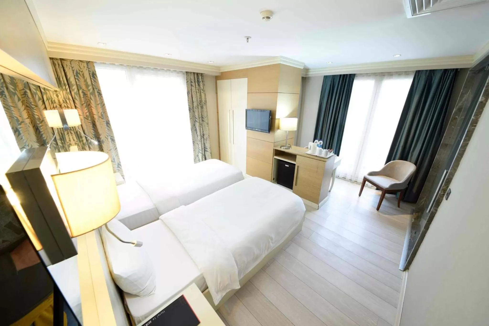 Bed in Hotel Le Mirage