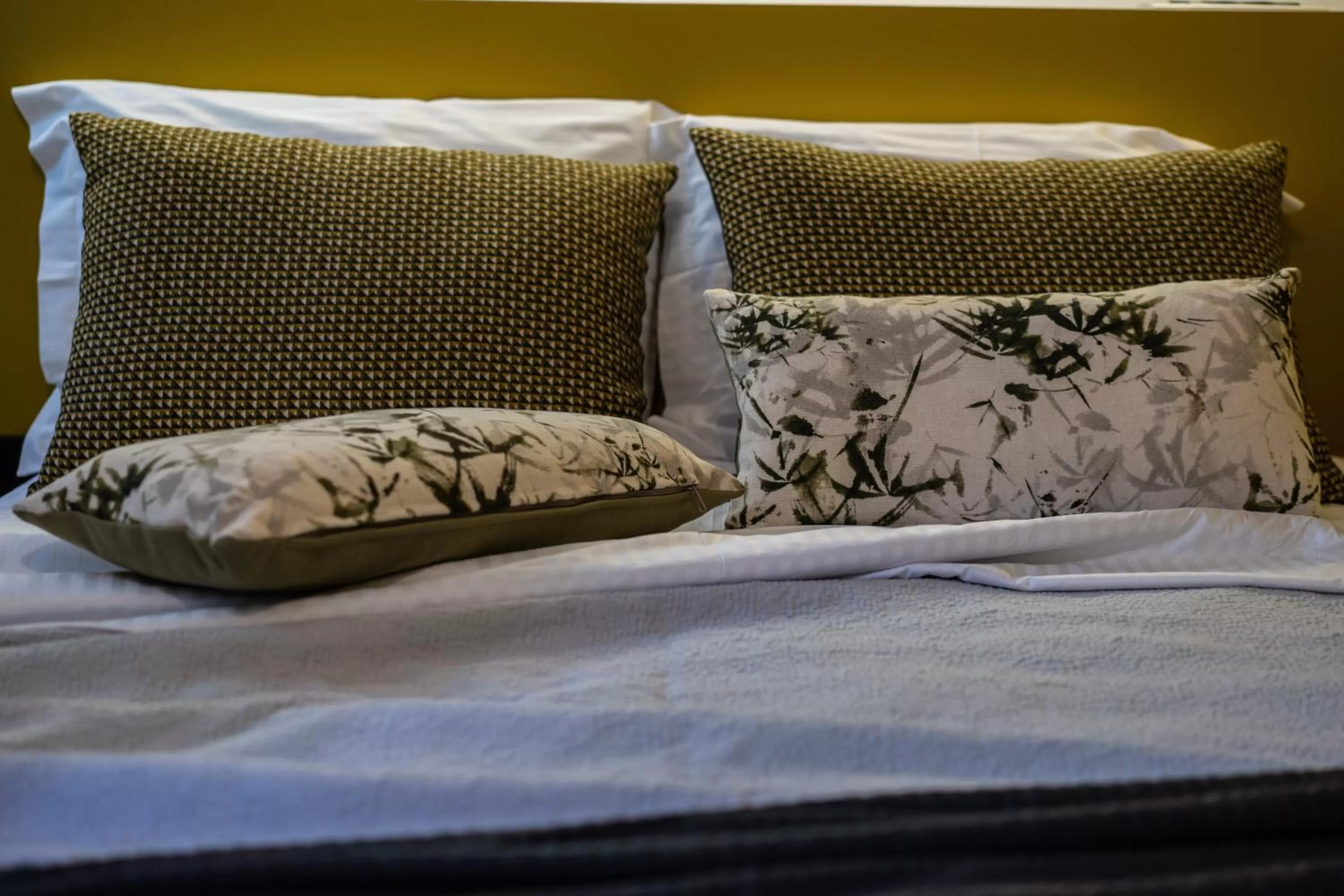 Bed in Aethra Boutique Rooms