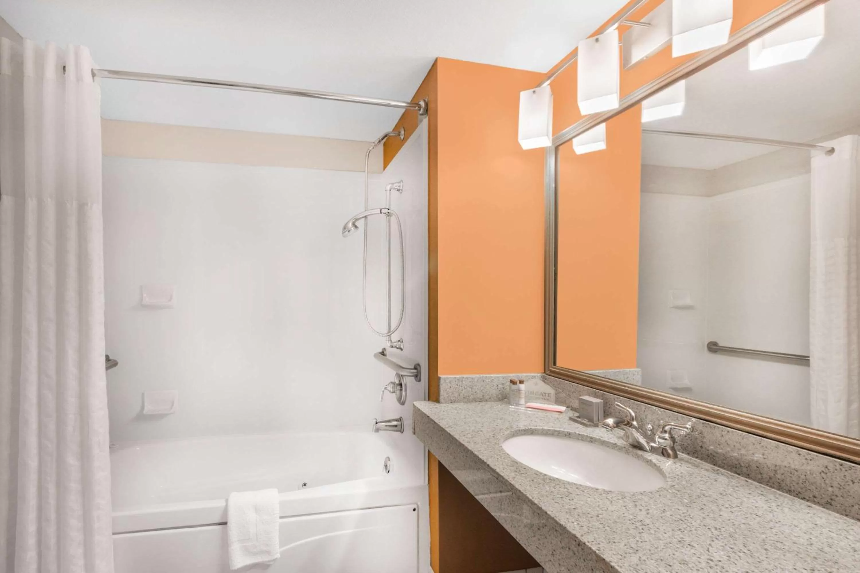 Bathroom in Wingate by Wyndham West Monroe