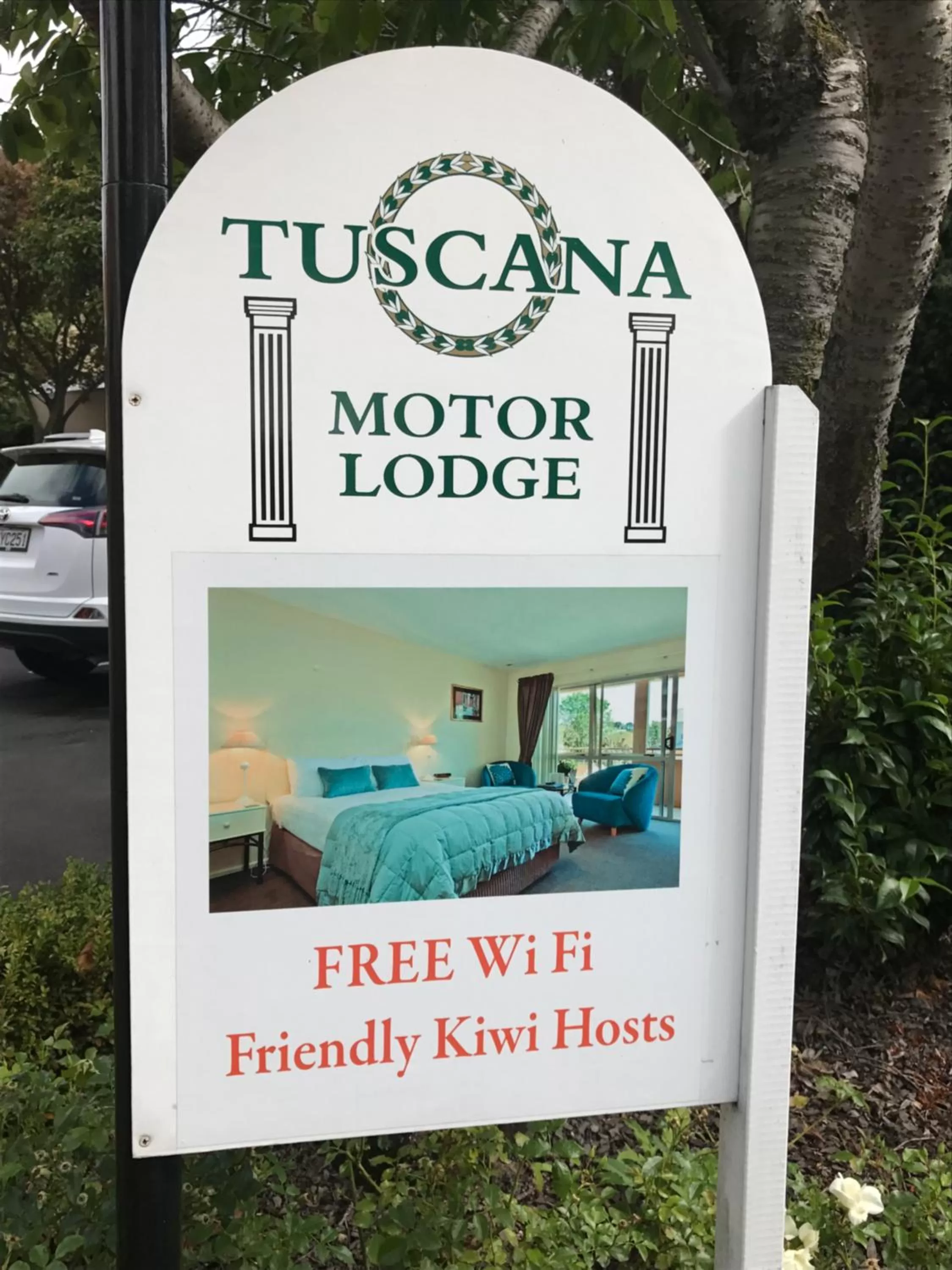 Property logo or sign in Tuscana Motor Lodge