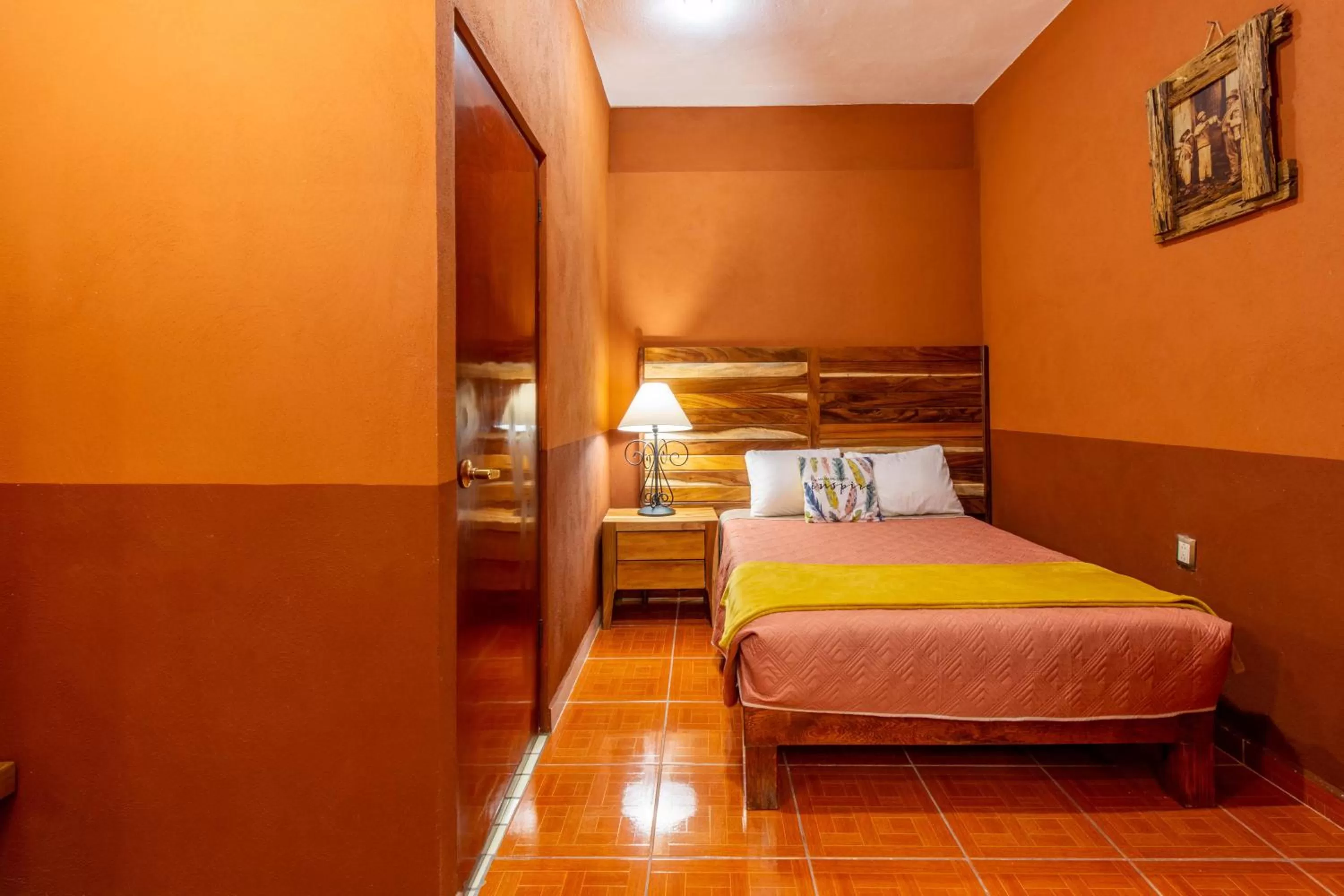 Bed in Hostería Casa Marquez