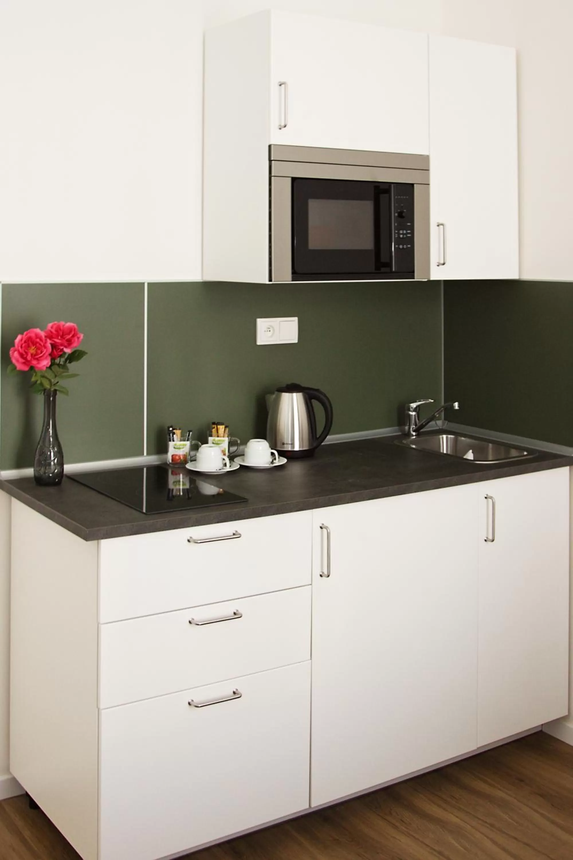 Kitchen or kitchenette in Elizabeth Suites
