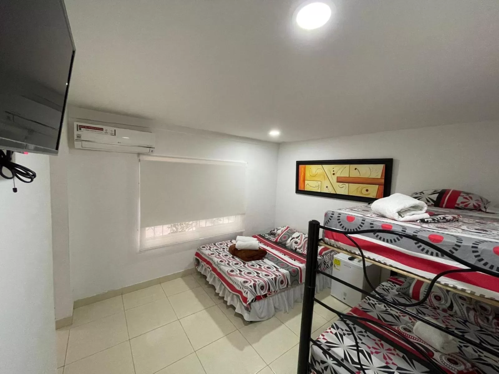 Photo of the whole room, Bed in Lindos apartaestudios y habitaciones en Ibague