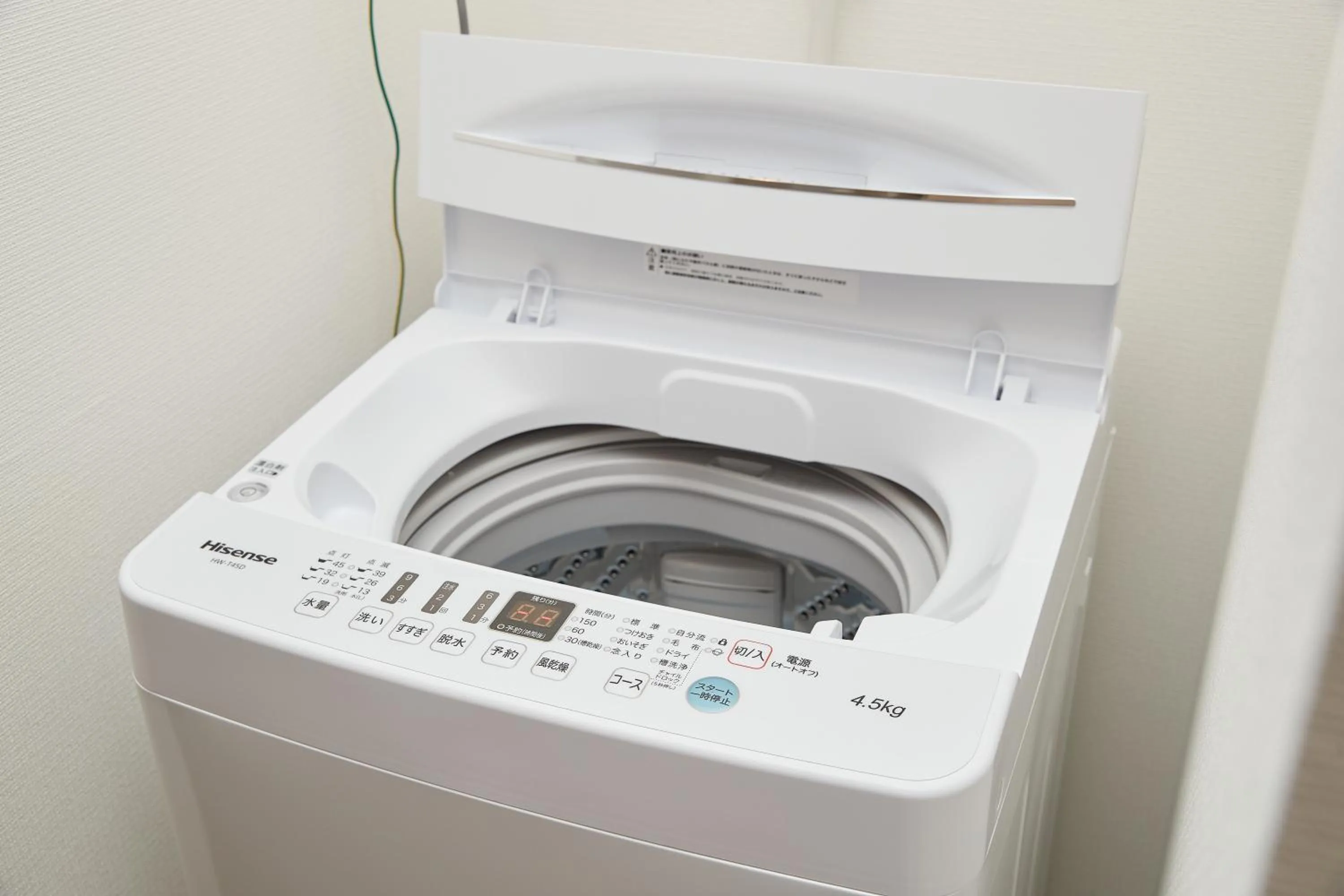 washing machine in New Normal Hotel in NAMINOUE ニューノーマルホテルイン波の上
