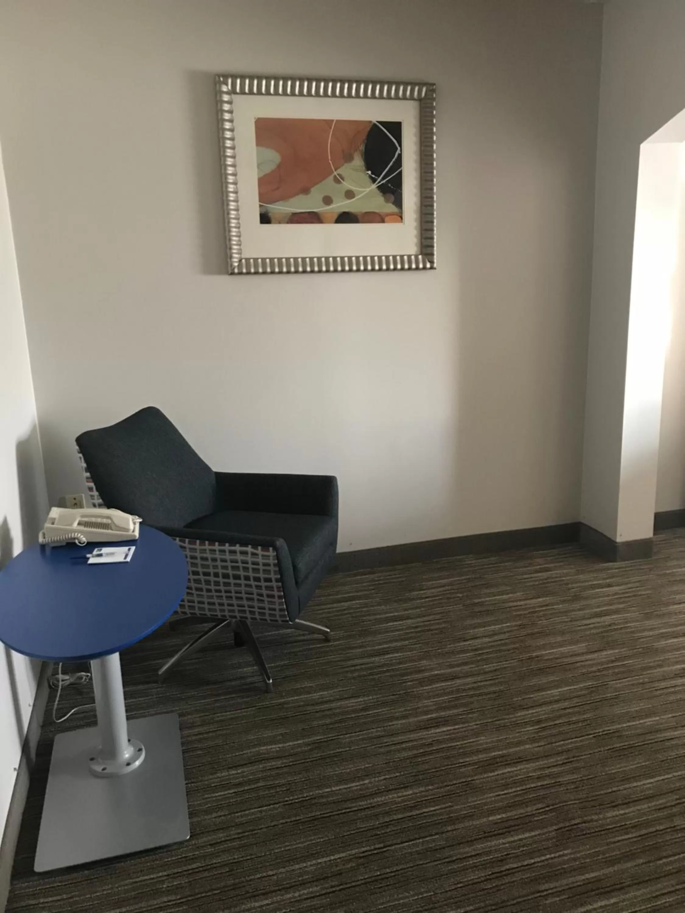 Seating area in Holiday Inn Express Hotel & Suites Louisville East by IHG