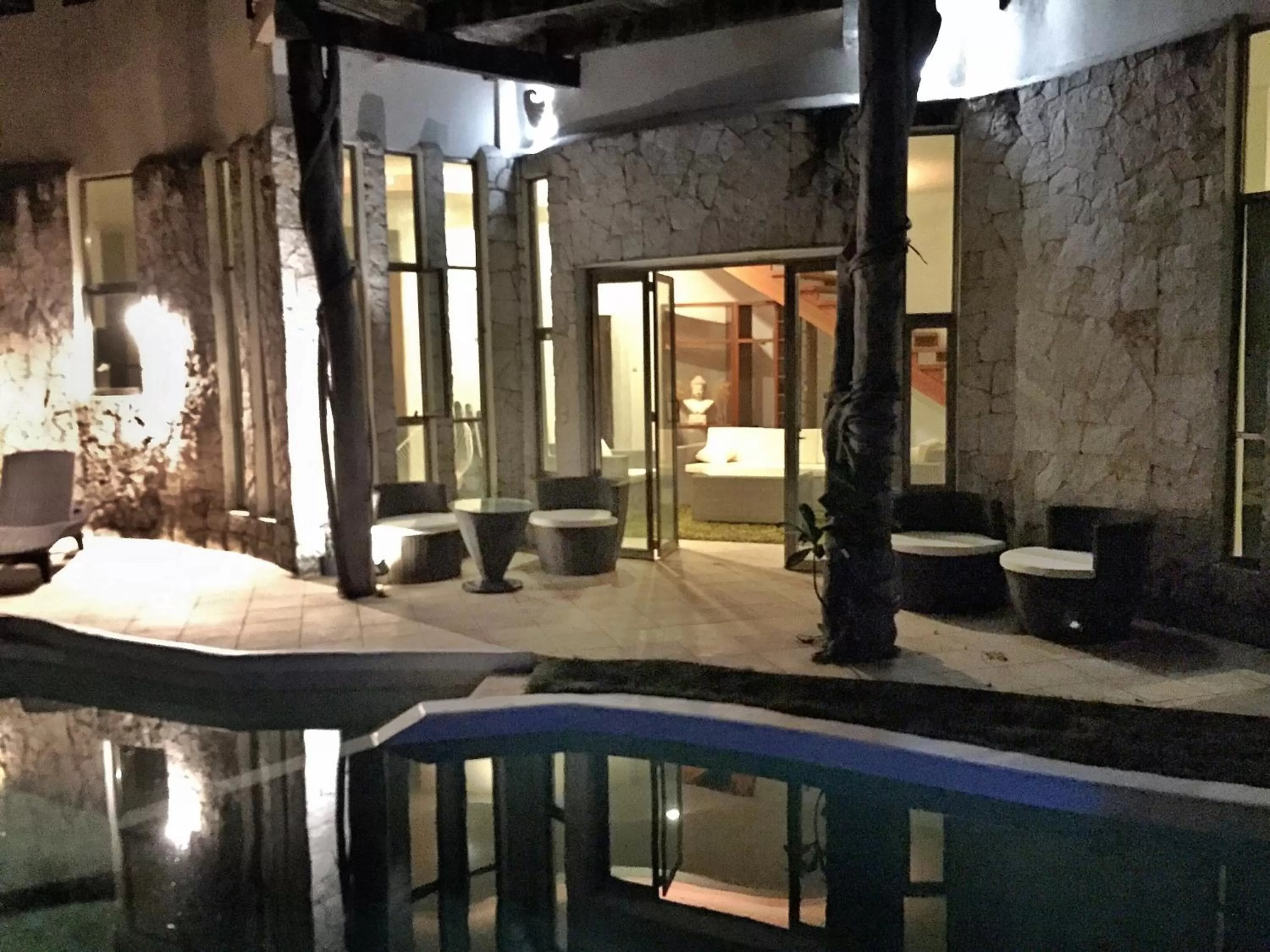 Communal lounge/ TV room, Swimming Pool in Harmony Glamping Boutique Hotel and Yoga