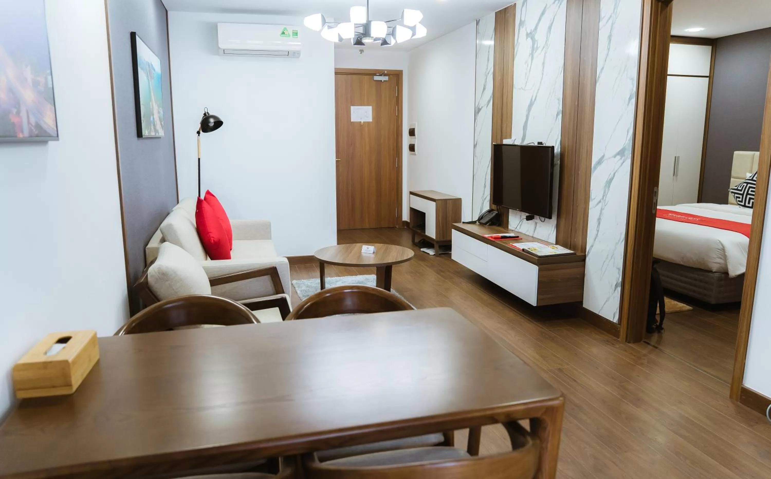 Living room, Bed in Ramada Hotel & Suites by Wyndham Halong Bay View