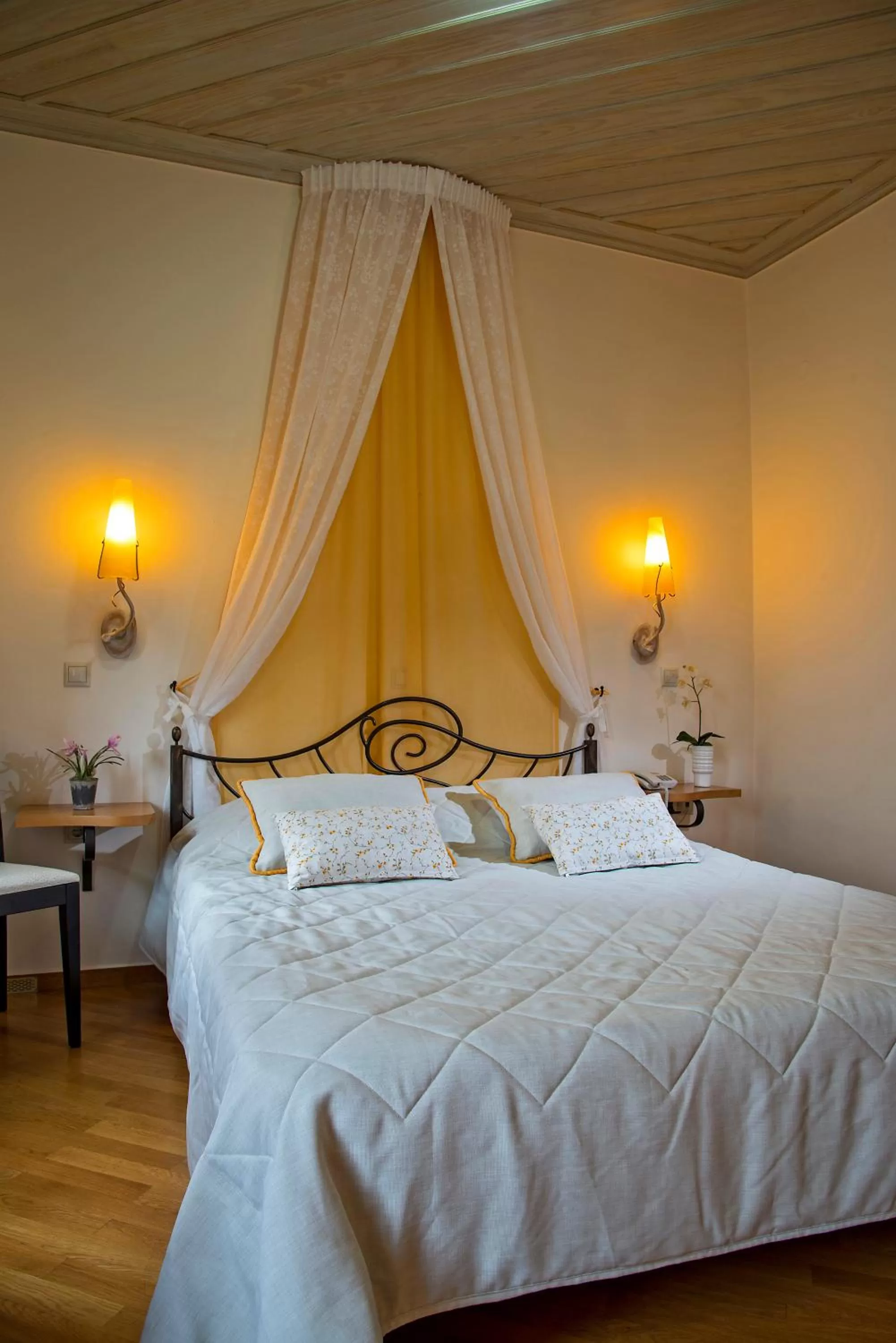 Bed in Ionas Boutique Hotel