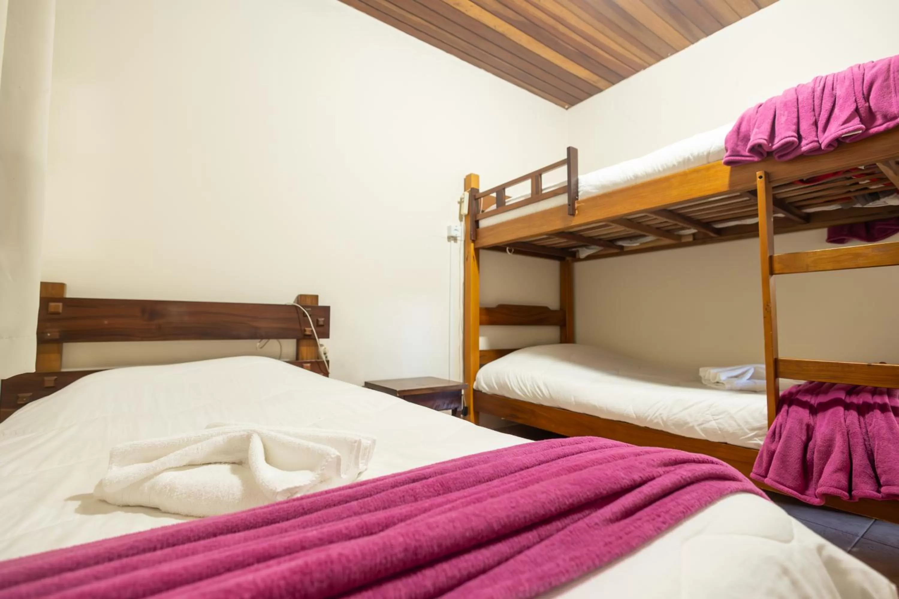 Bed in Pousada 3 Pinheiros