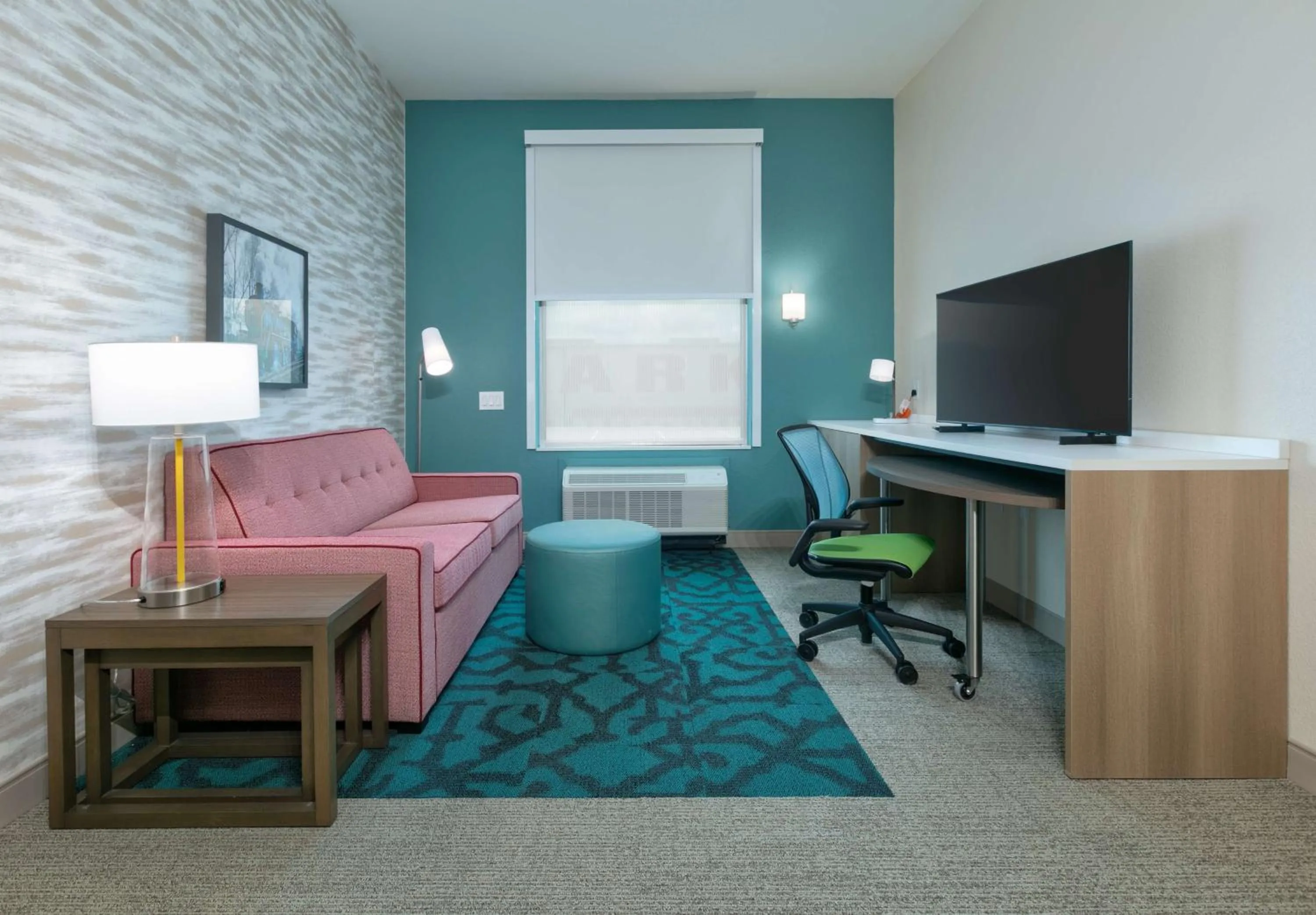 Living room, Bed in Home2 Suites By Hilton El Campo