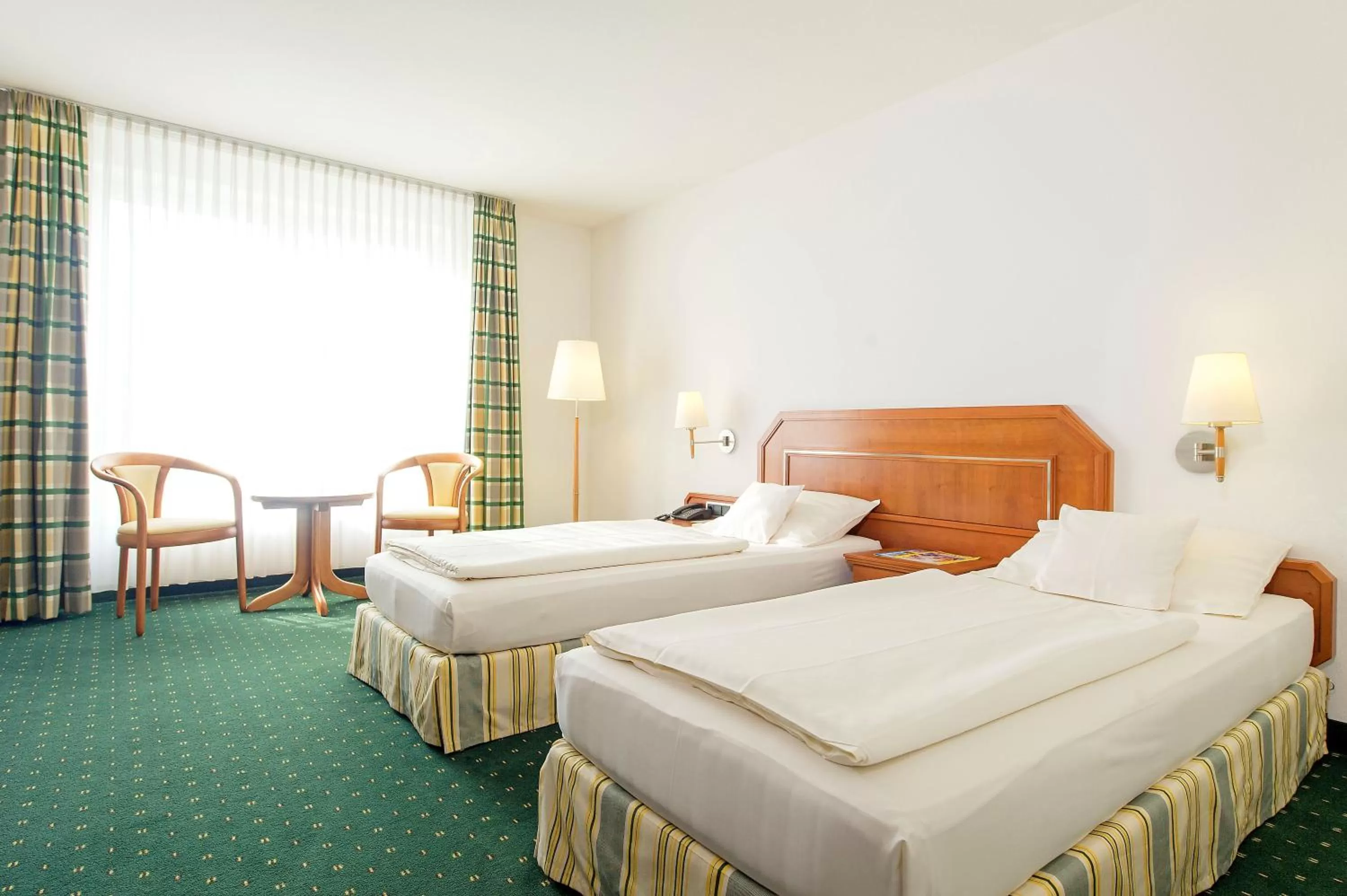 Photo of the whole room, Bed in Maifeld Sport- und Tagungshotel