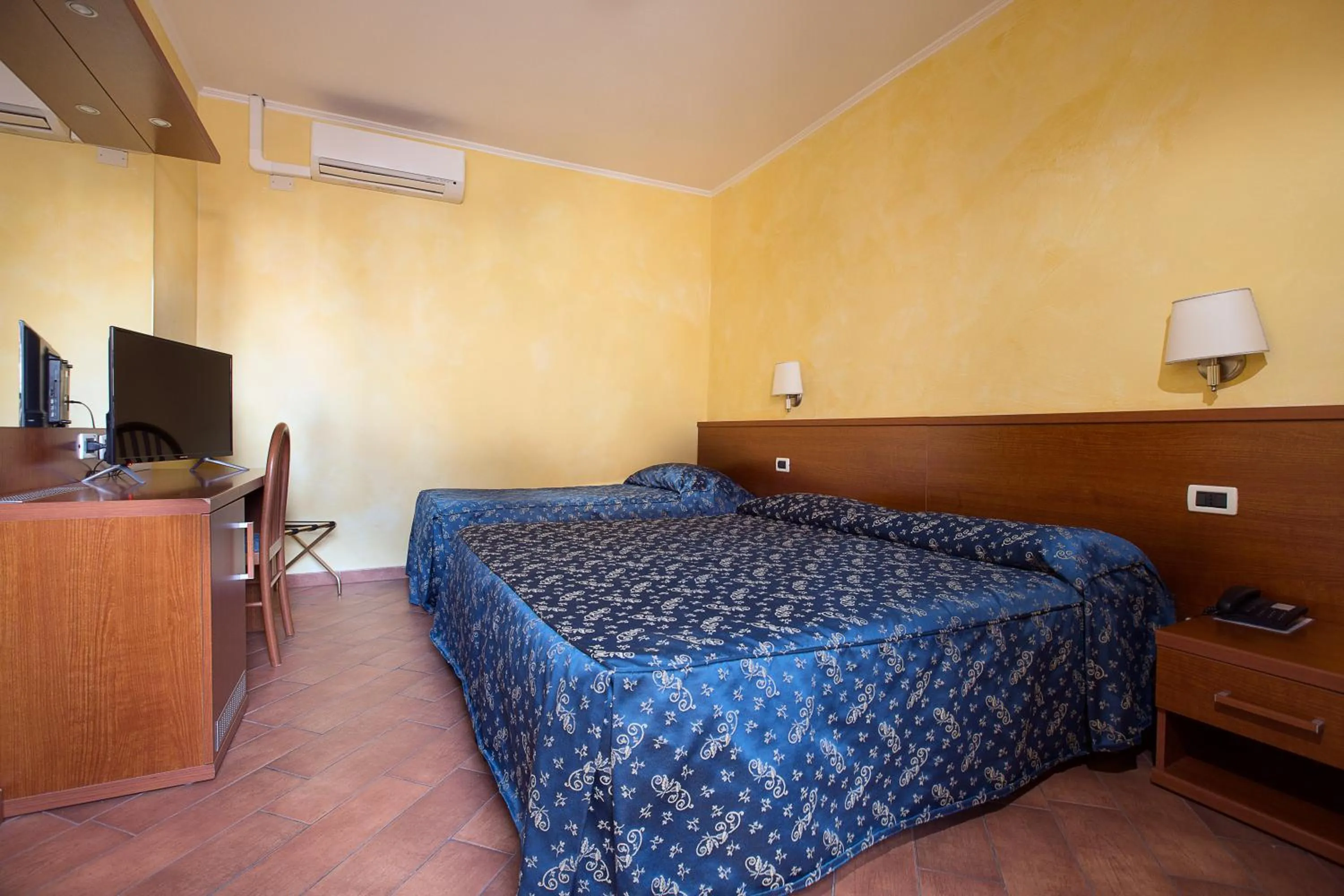 Bed in Albergo Dei Leoni