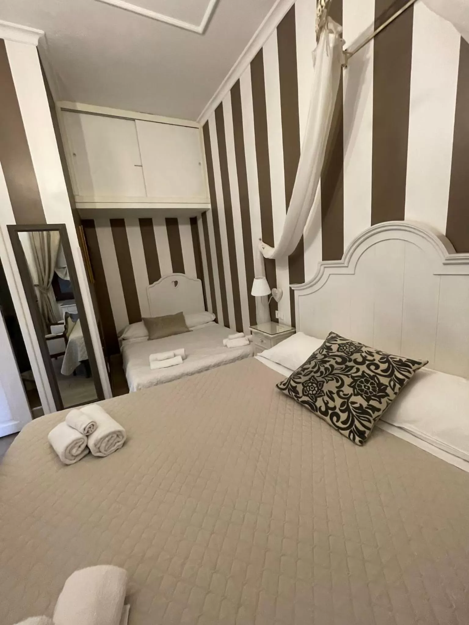 Bed in Vatican Boutique inn