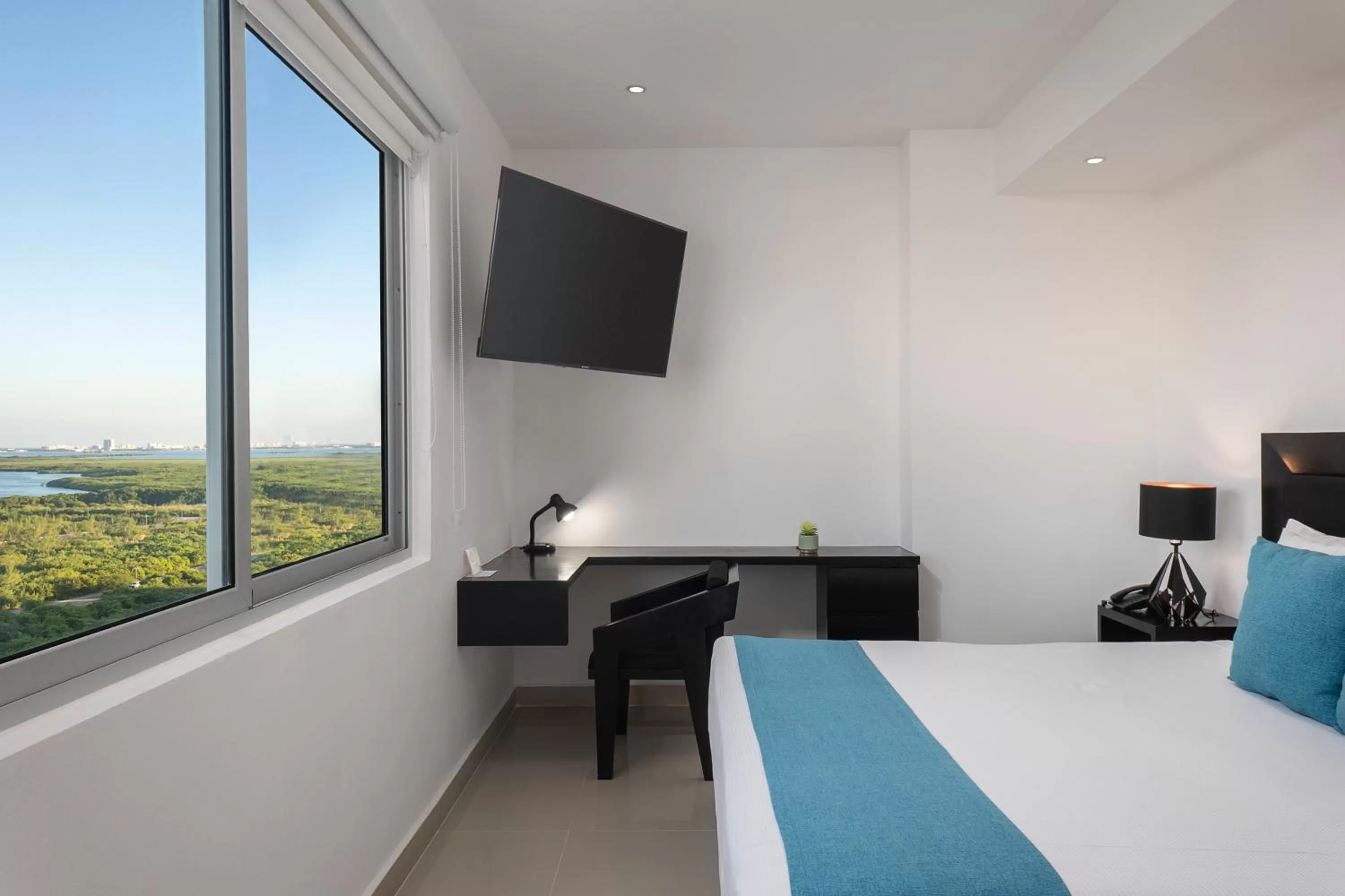 Bed in Suites Malecon Cancun