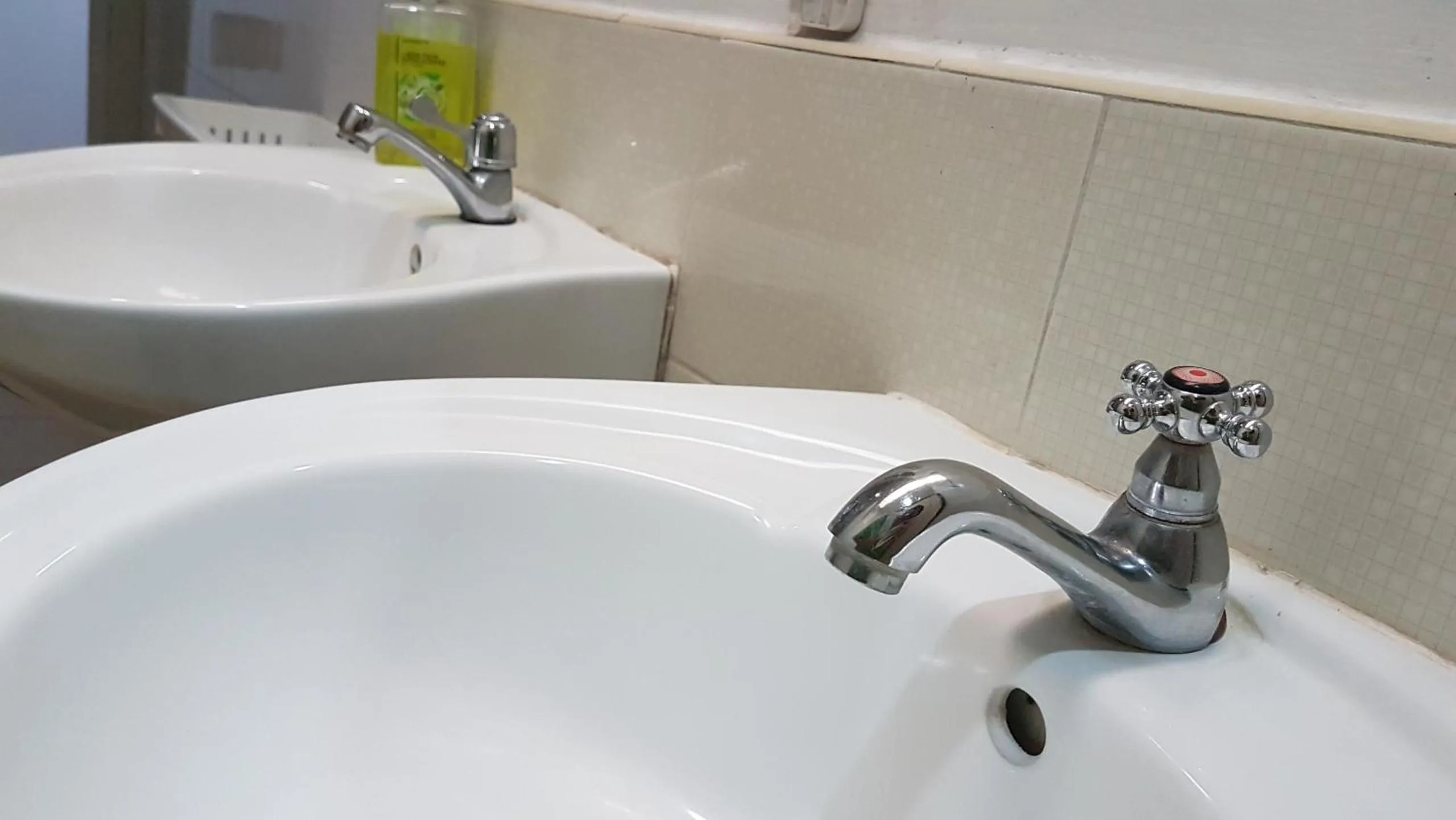 Bathroom in Crossroads Hostel Manila