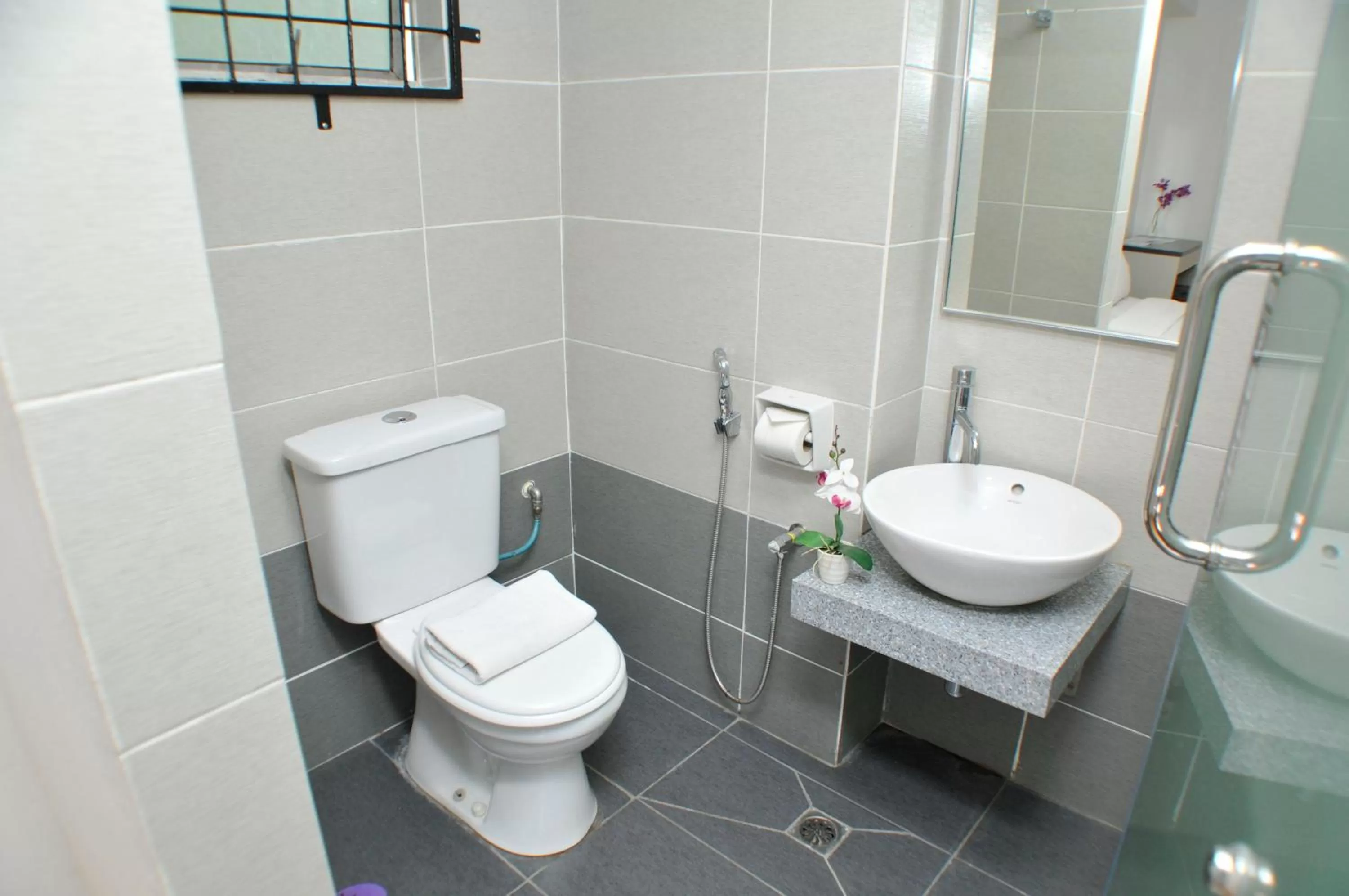 Bathroom in Promenade Service Apartment