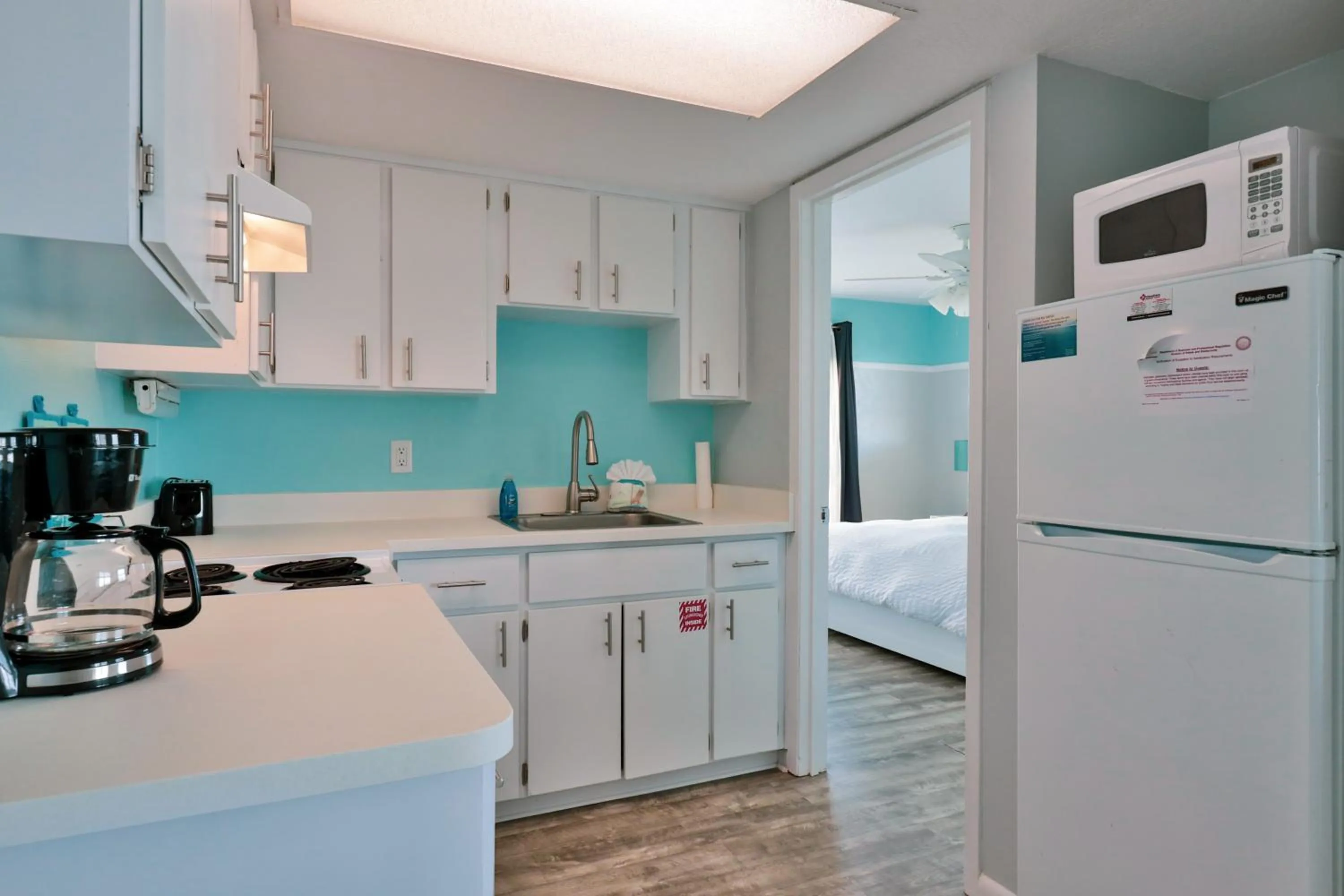 Kitchen or kitchenette, Bed in Coastal Waters