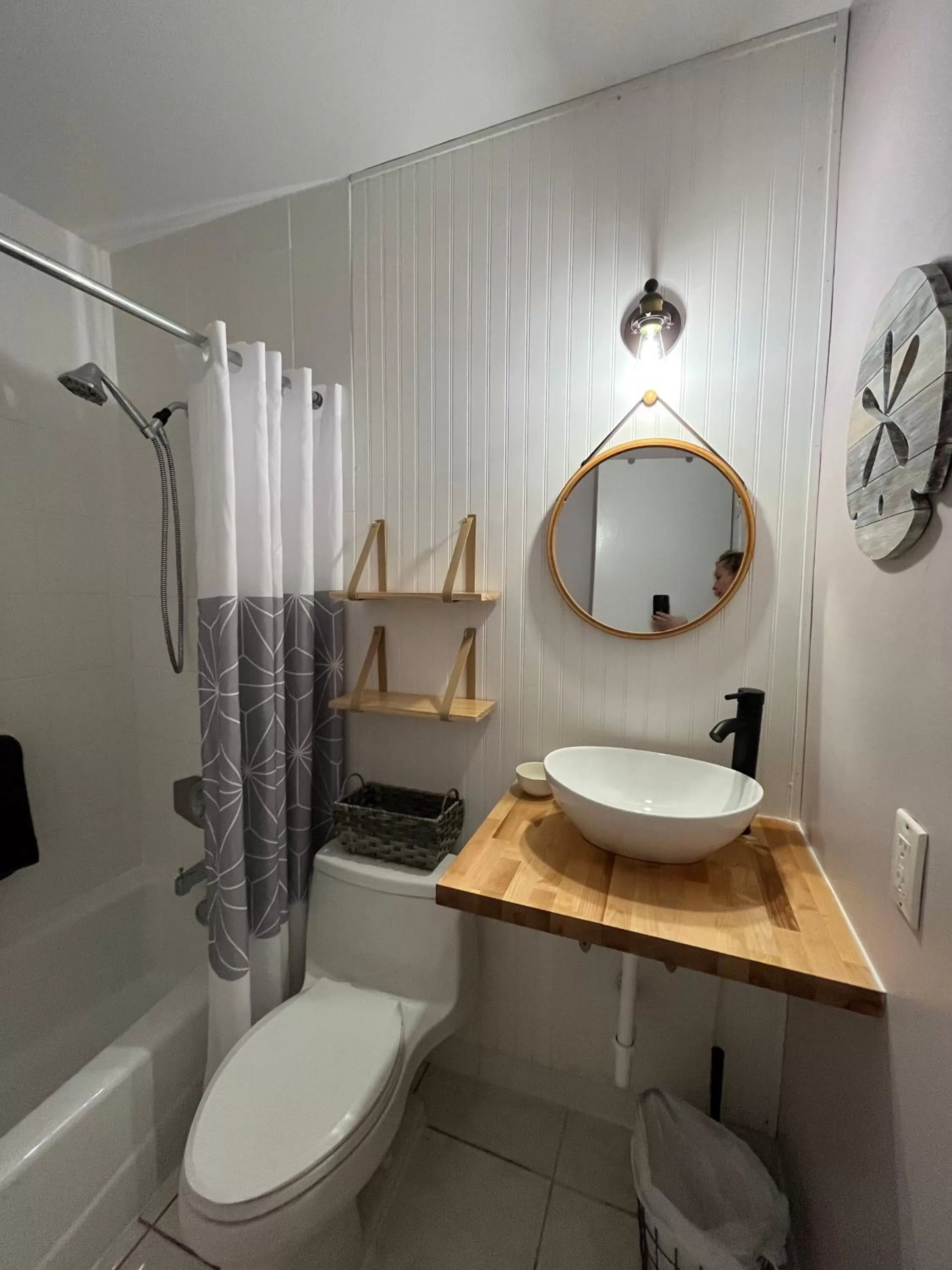 Bathroom in 4145 By The Sea Inn & Suites