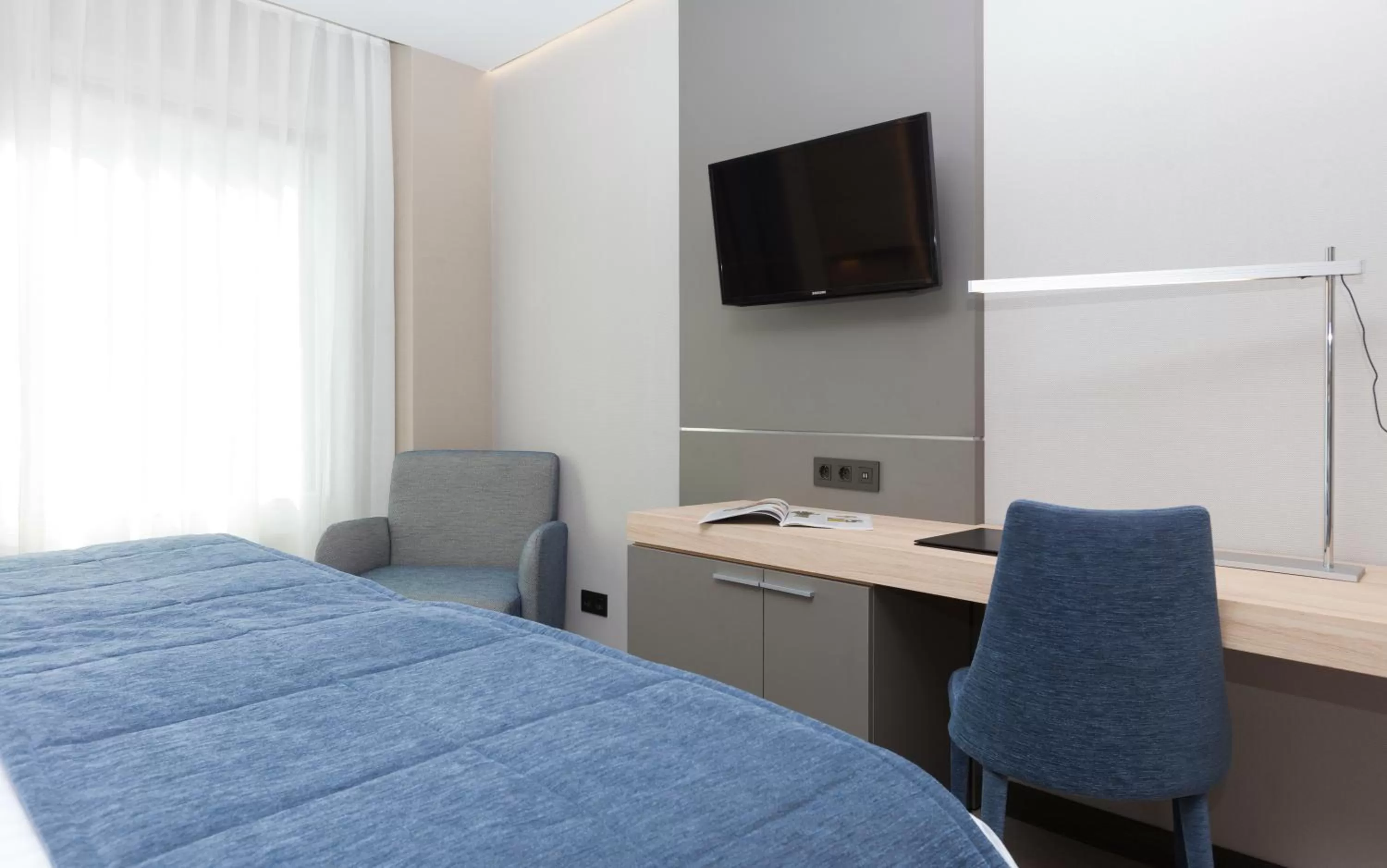 Bed in Hotel Liabeny