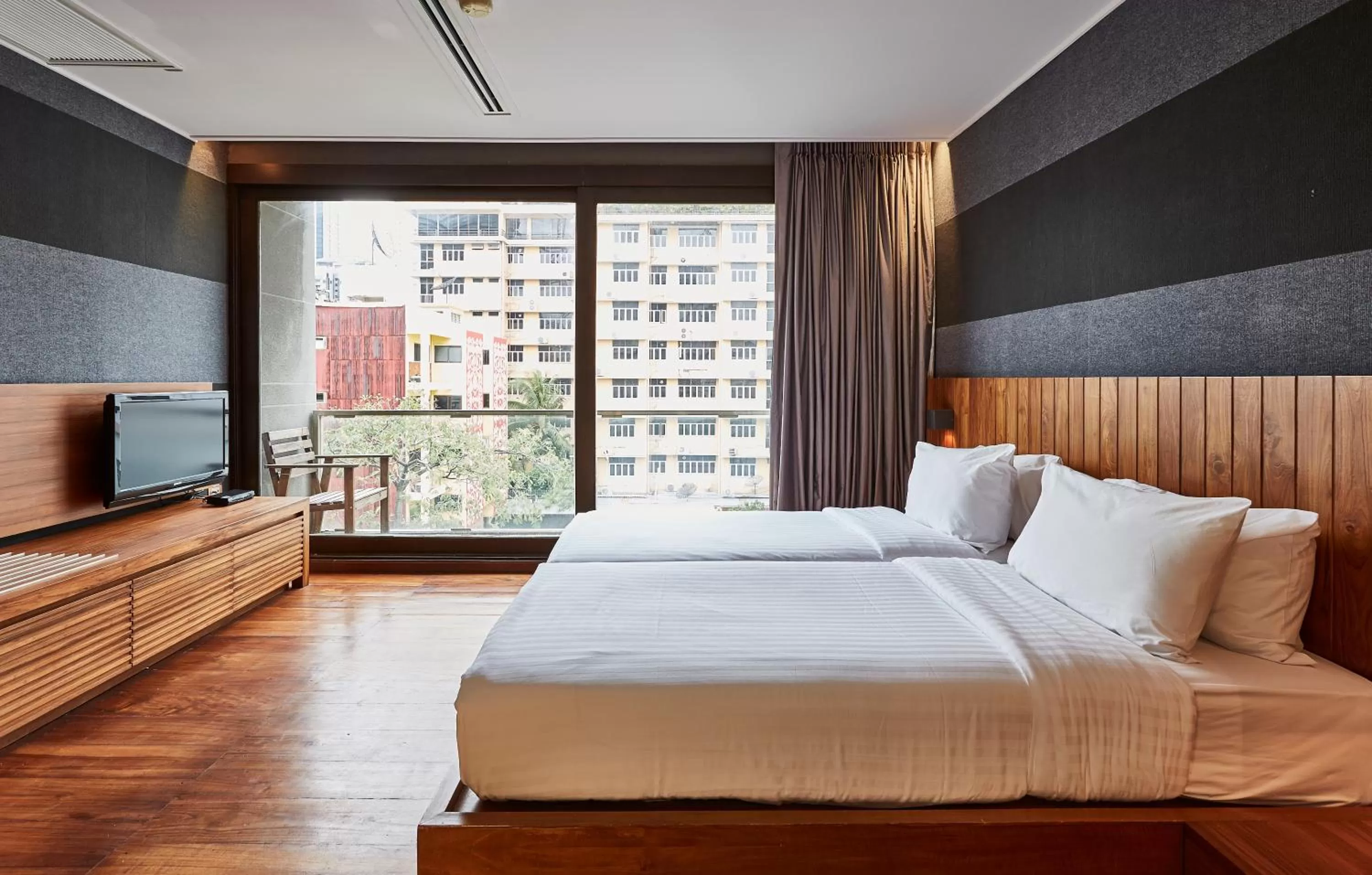 Bed in LUXX Langsuan Hotel - SHA Plus