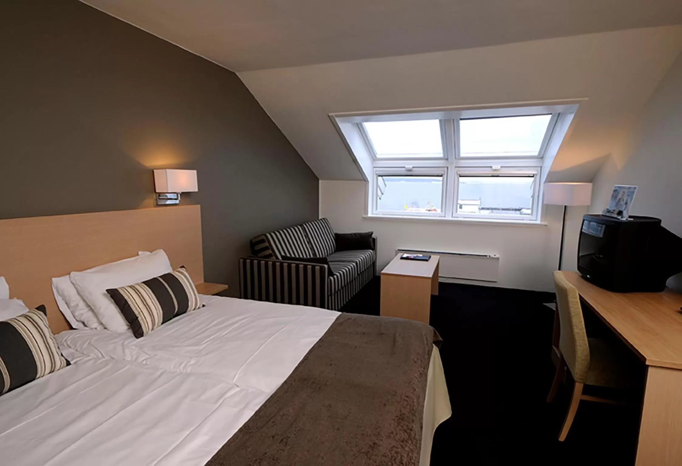 Seating area, Bed in Grand Hotel Åsgårdstrand - Unike Hoteller