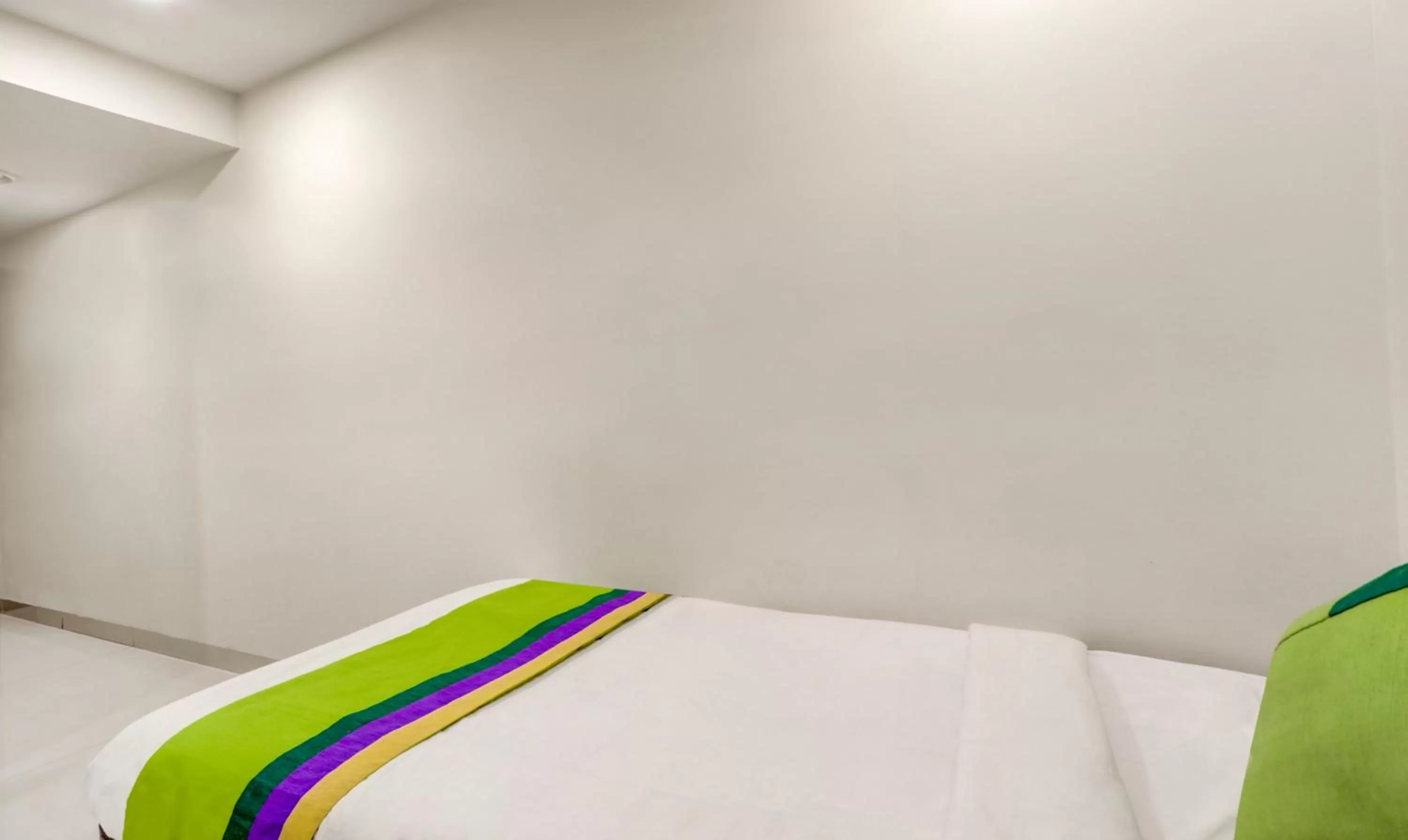 Bed in Treebo Trend Orange City