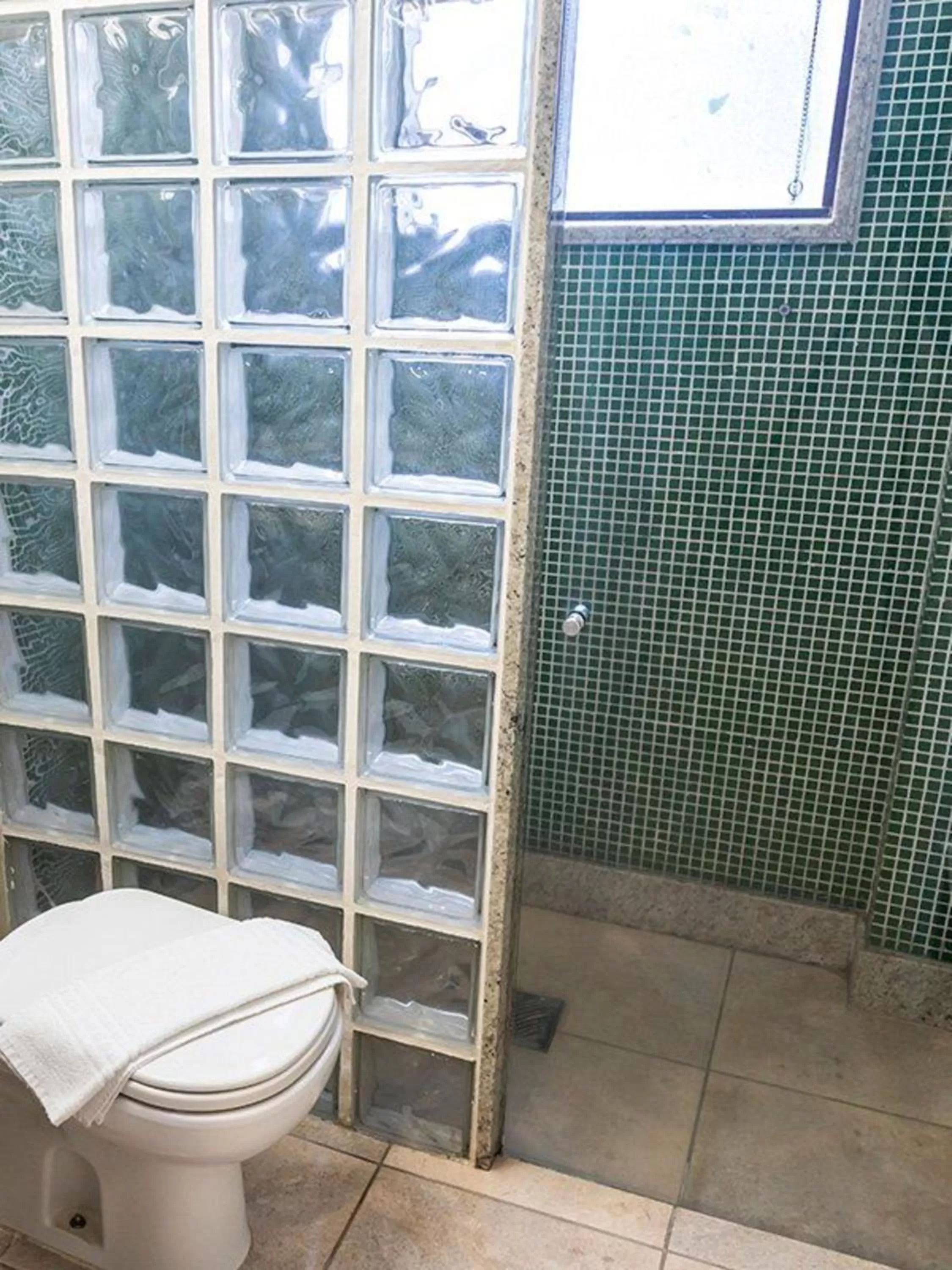 Toilet in VOA Plazza Hotel