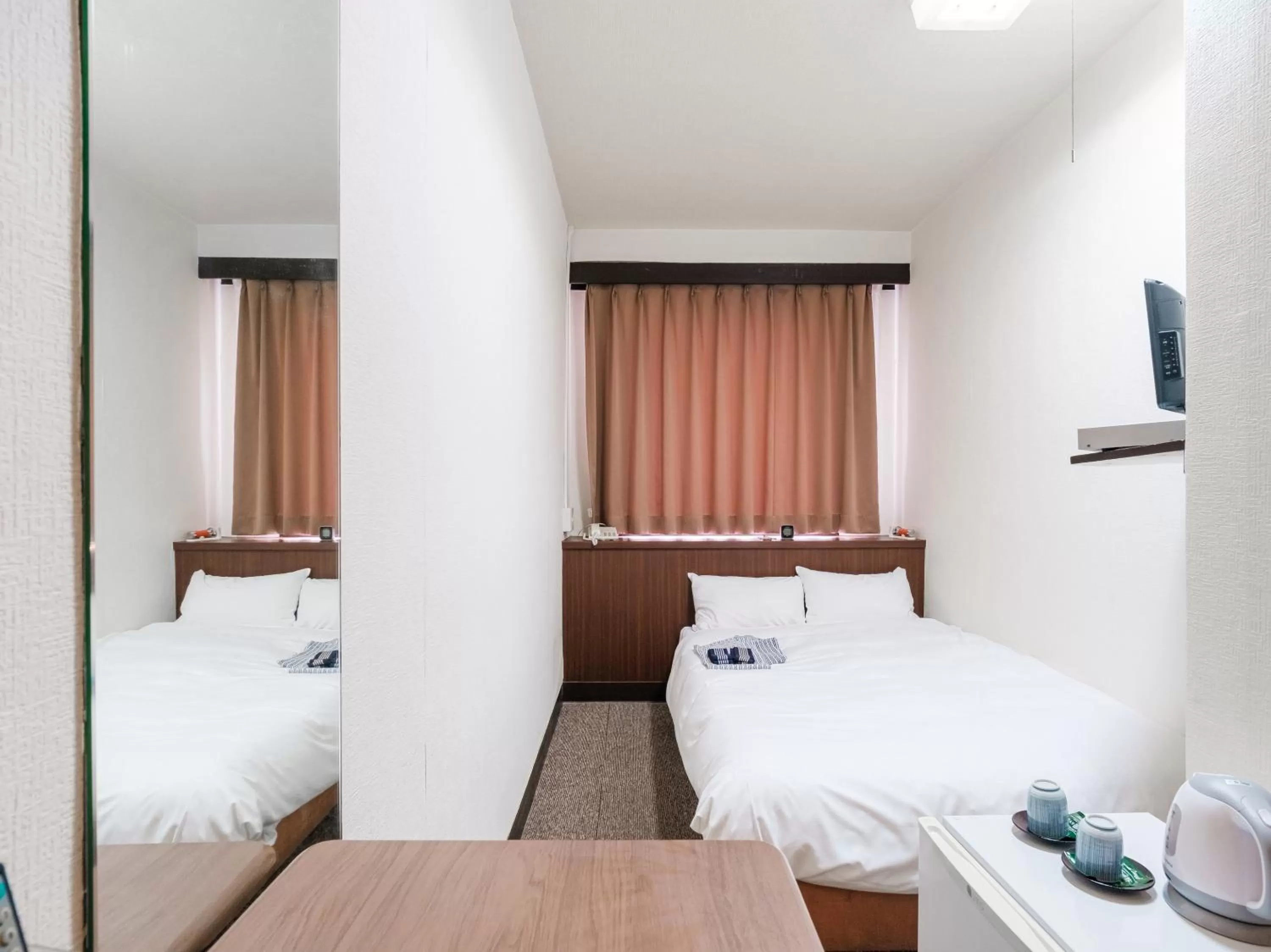 Bed in Tabist Hotel Tetora Hakodate Station