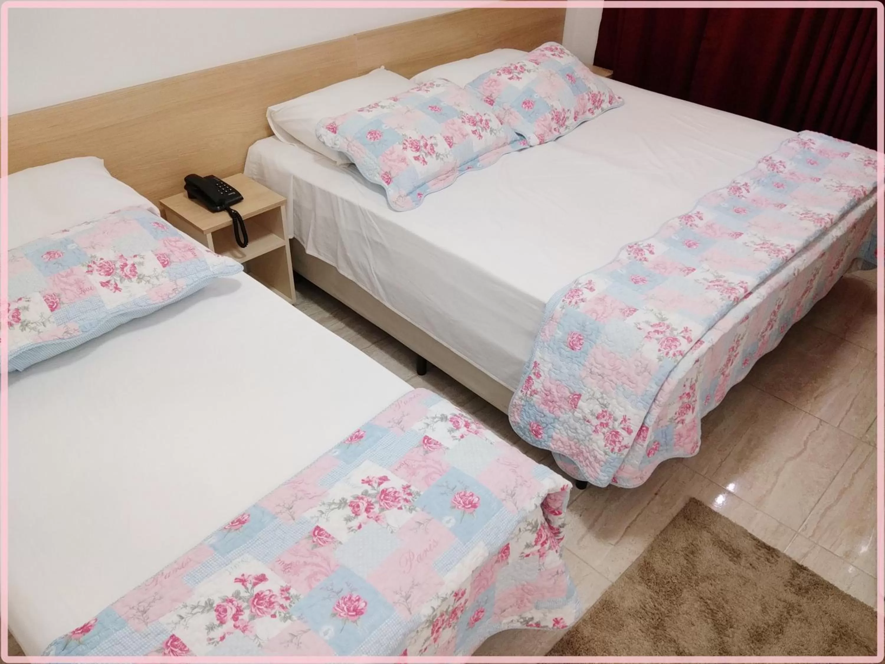 Bed in Hotel Anjos LTDA