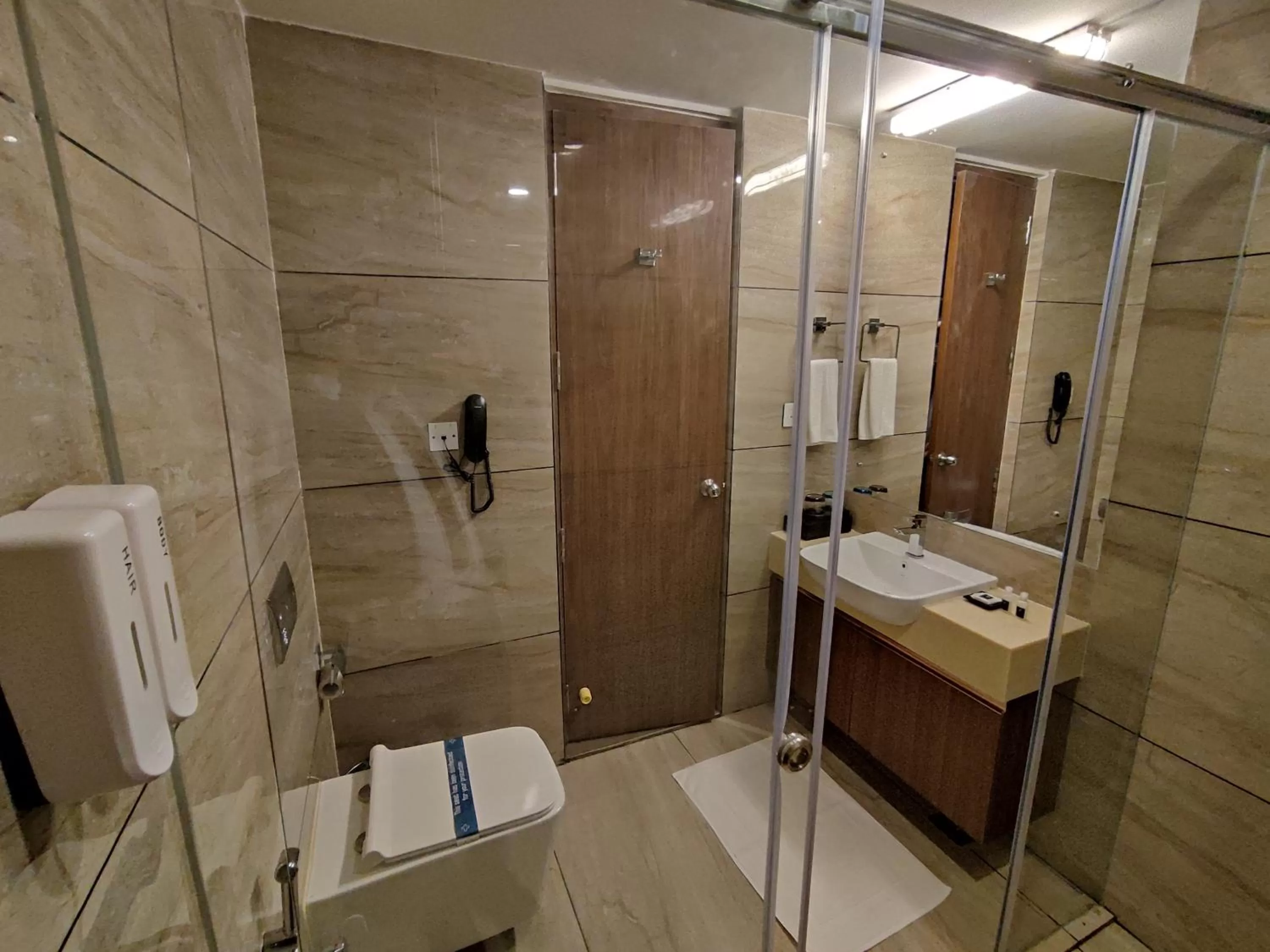 Bathroom in Fezinn Hotel - Best Wayanad Hotel in 2024