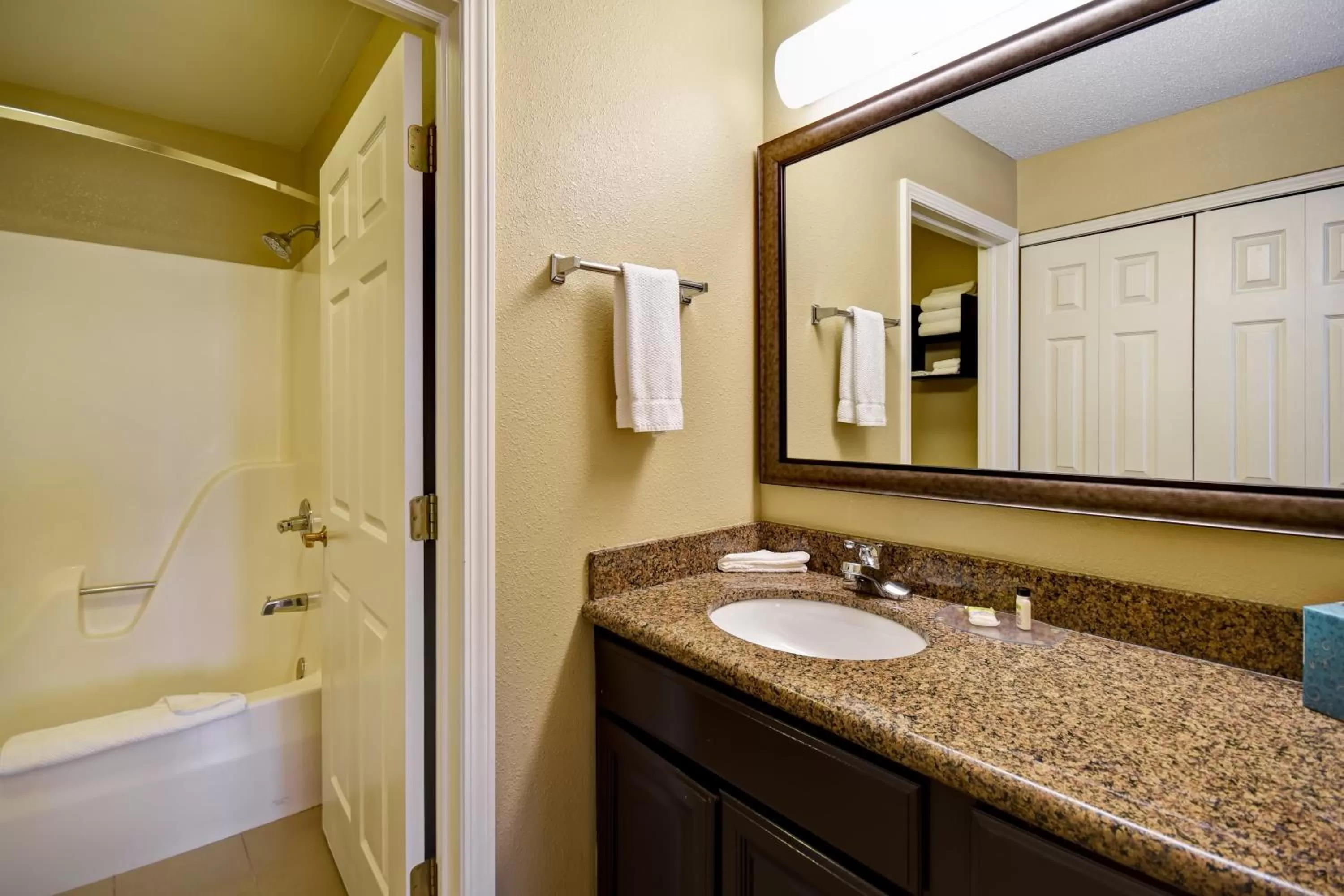 Two-Bedroom Suite with One Queen and Two Double Beds in Staybridge Suites Grand Rapids-Kentwood, an IHG Hotel