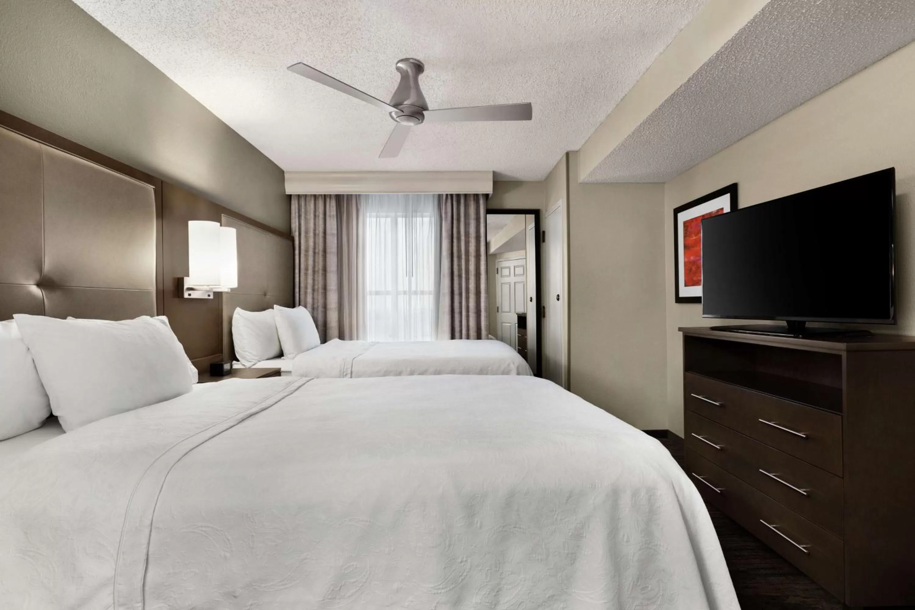 Bed in Homewood Suites by Hilton Dallas-Plano