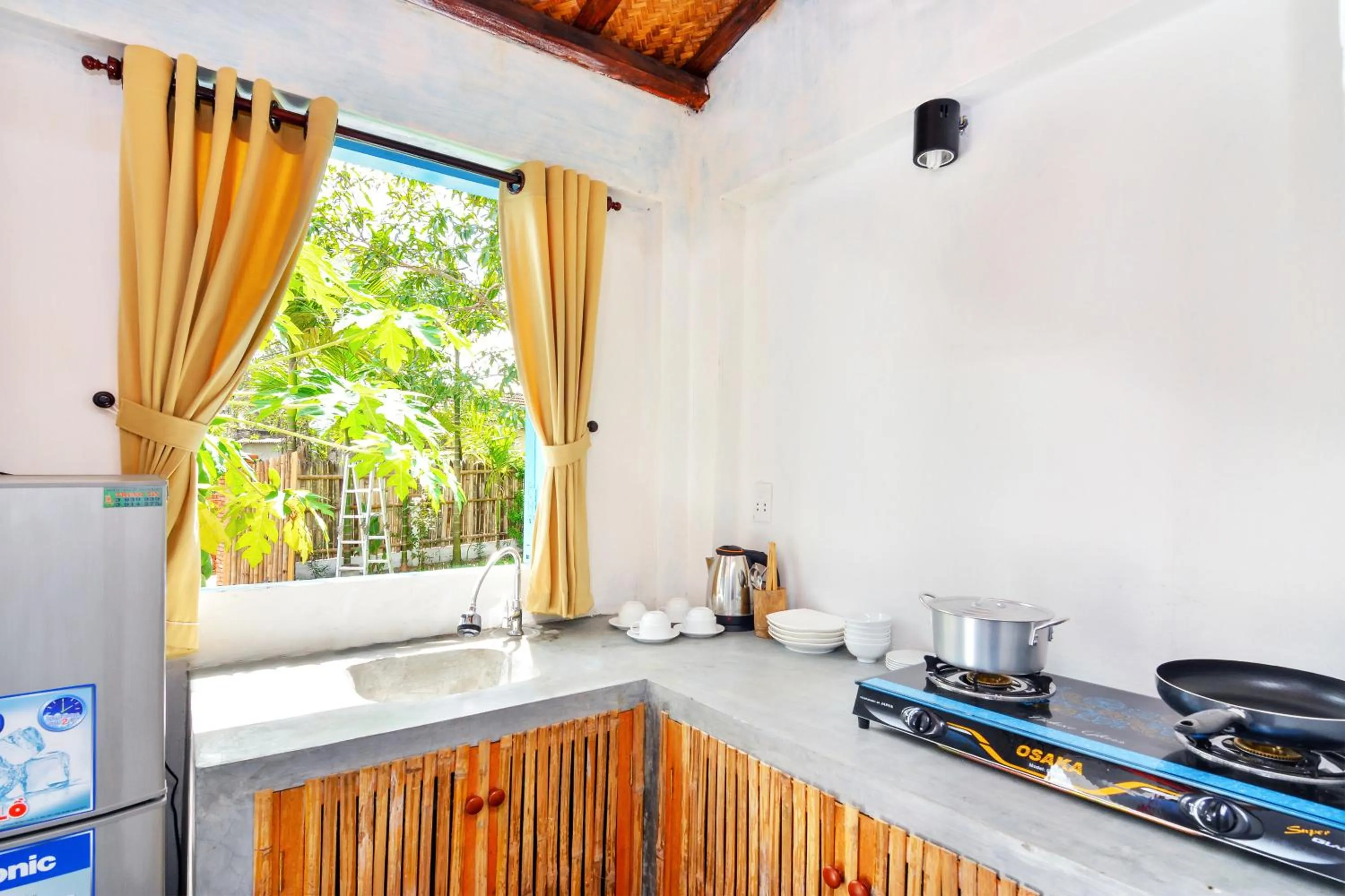 Kitchen or kitchenette in Local Beach Homestay