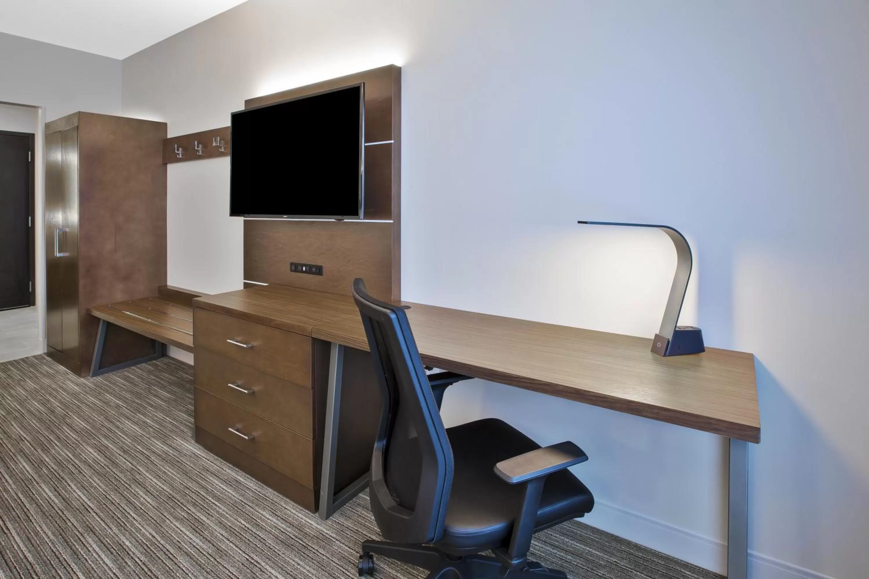 Living room in Holiday Inn Express & Suites Okemos - University Area by IHG