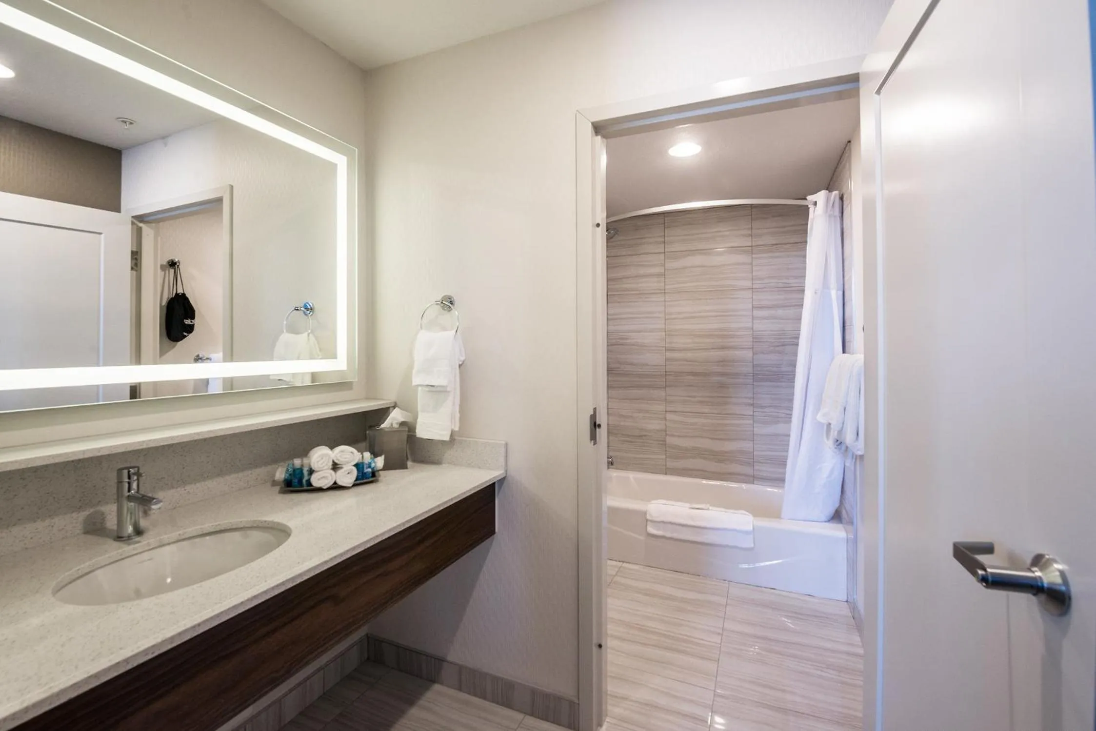 Bathroom in Encore Suites by Service Plus Inns