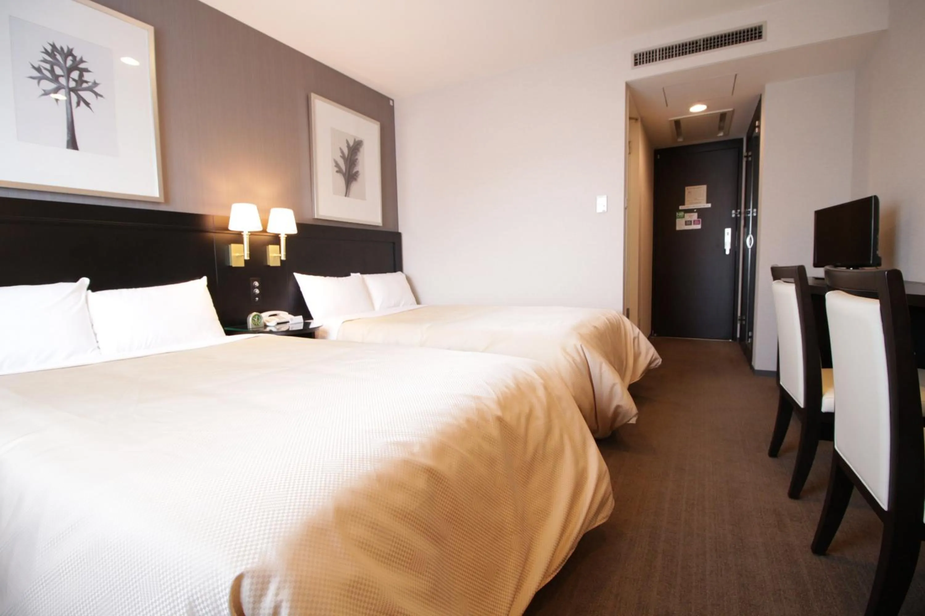 Photo of the whole room, Bed in Hotel Sunroute Ueda