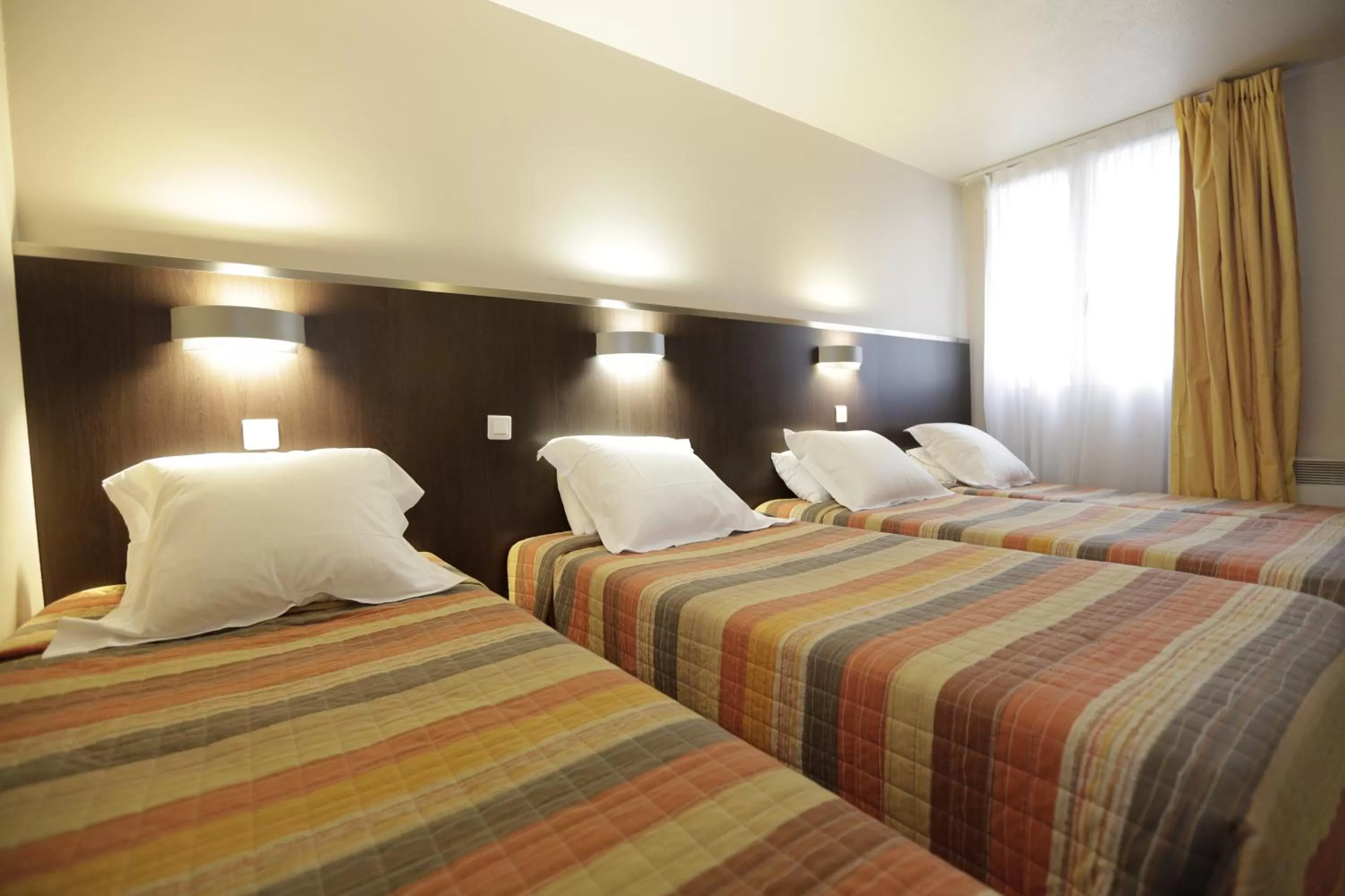 Bedroom, Bed in Hôtel Au Petit Caporal