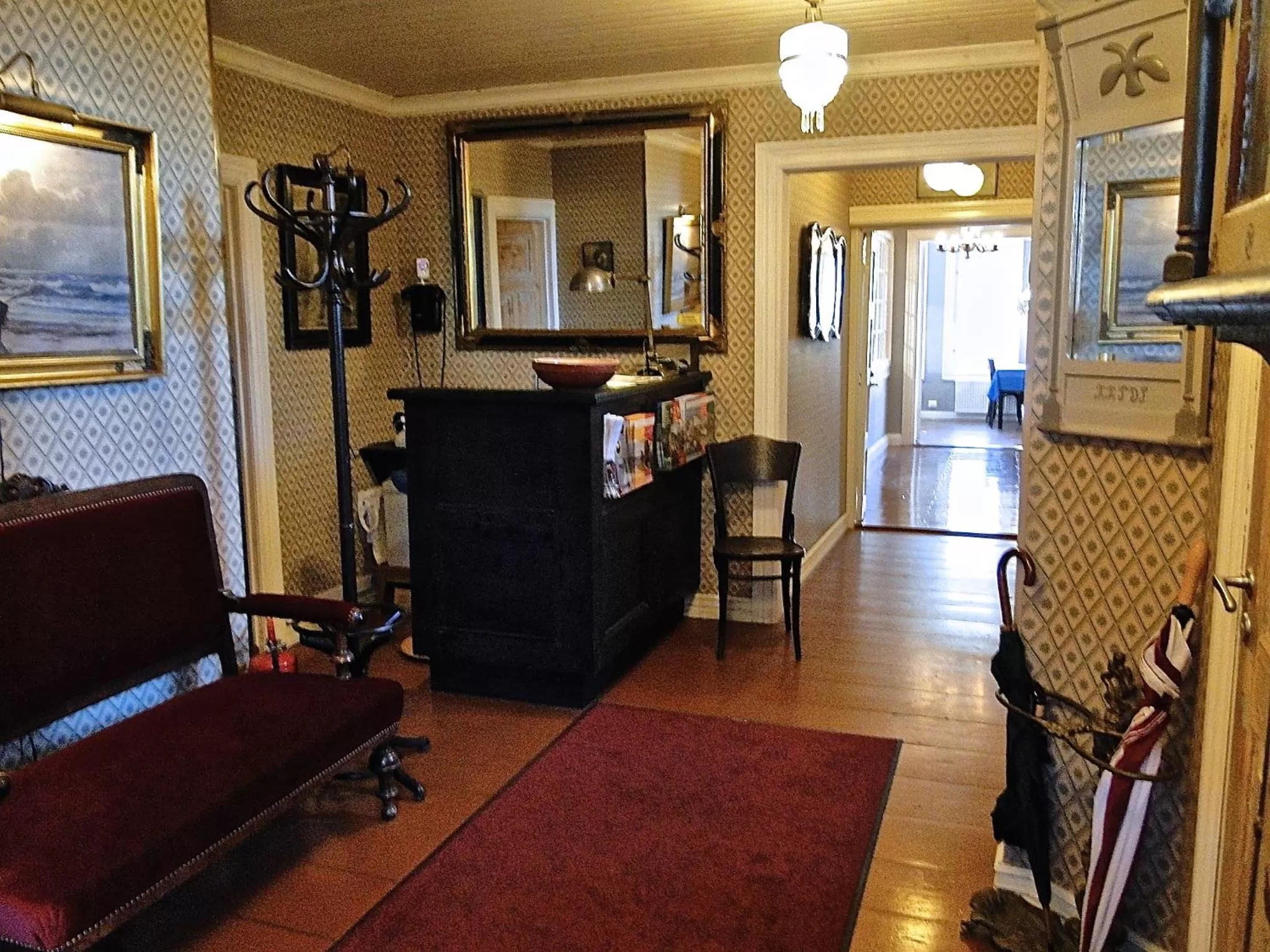 Lobby or reception in Hotel & Cafe Lanterna