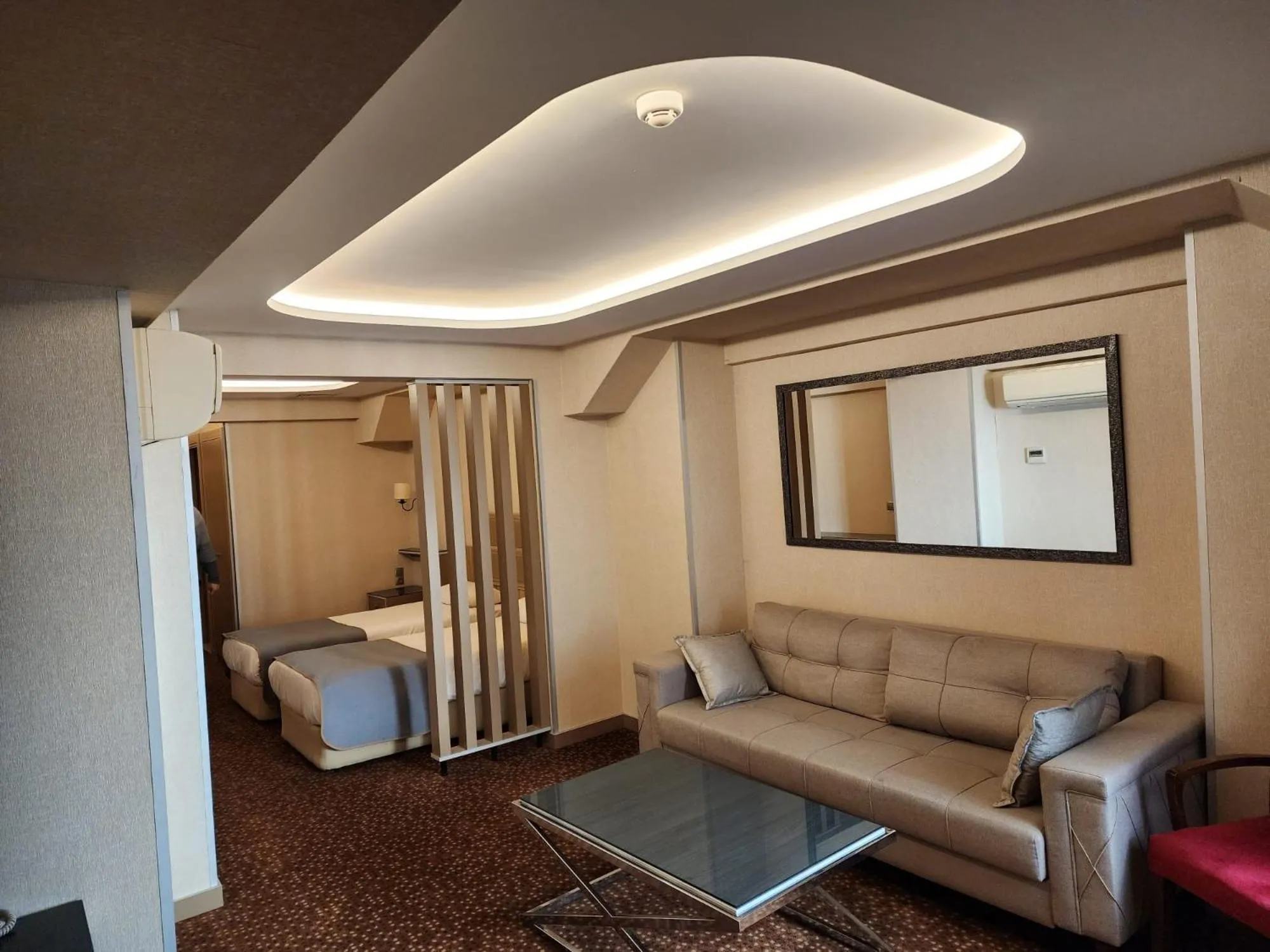 Living room, Bed in Nanda Hotel