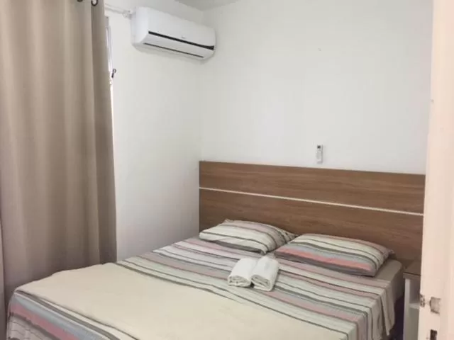 Bed in Pousada Almeida