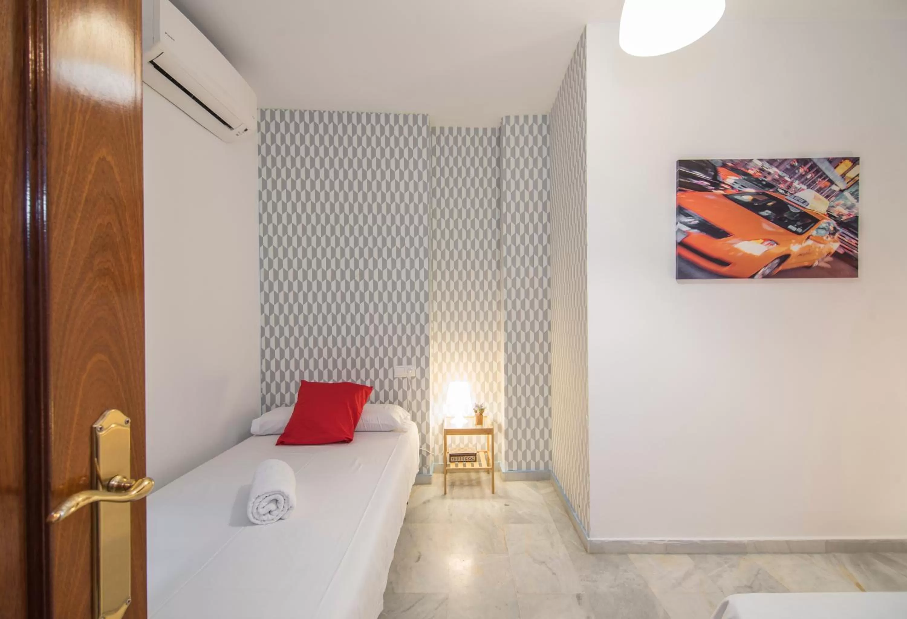 Property building, Bed in Apartamentos Granata