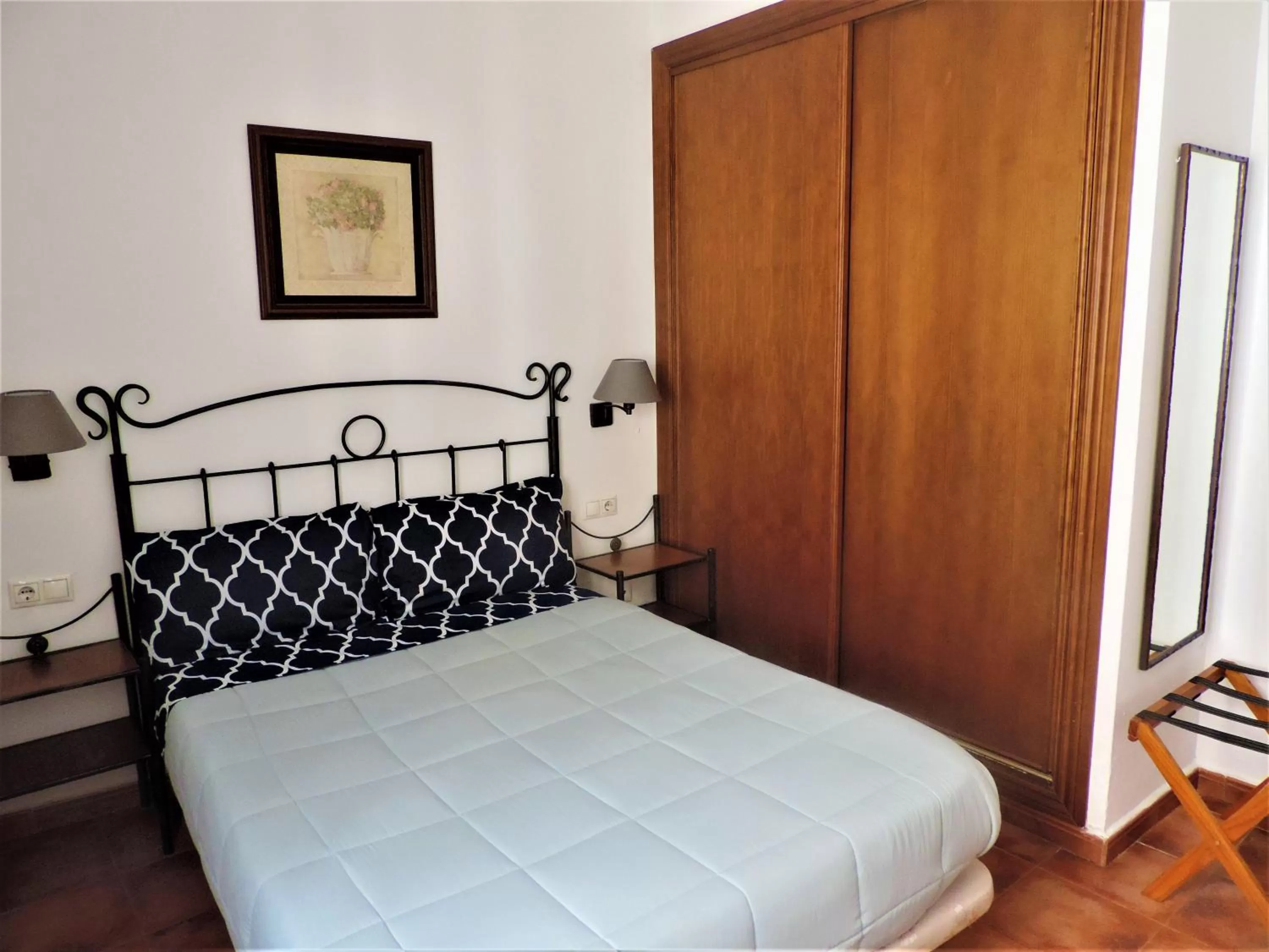 Bed in APARTAMENTOS CASERIA DE COMARES