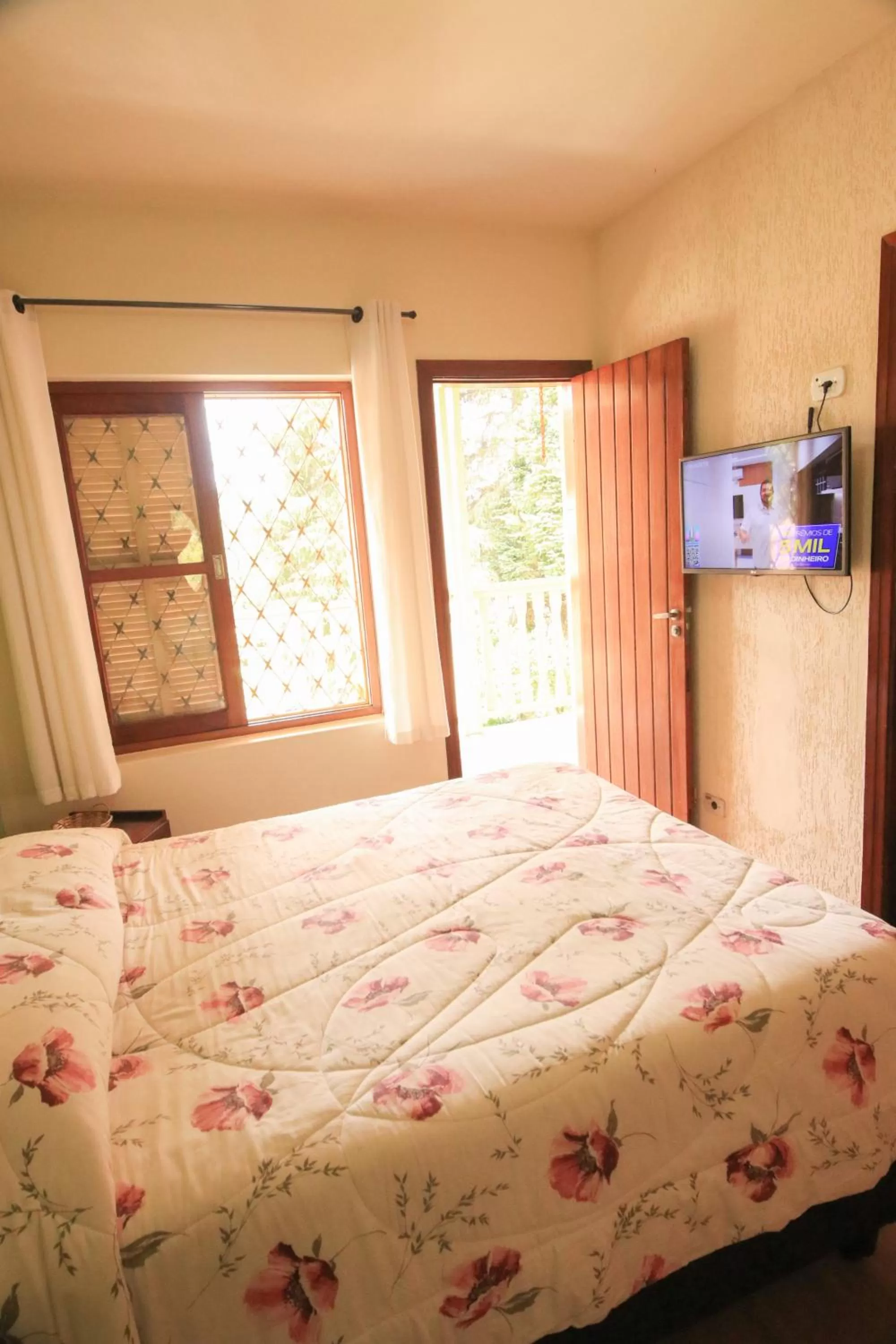 Bed in Pousada Curumi