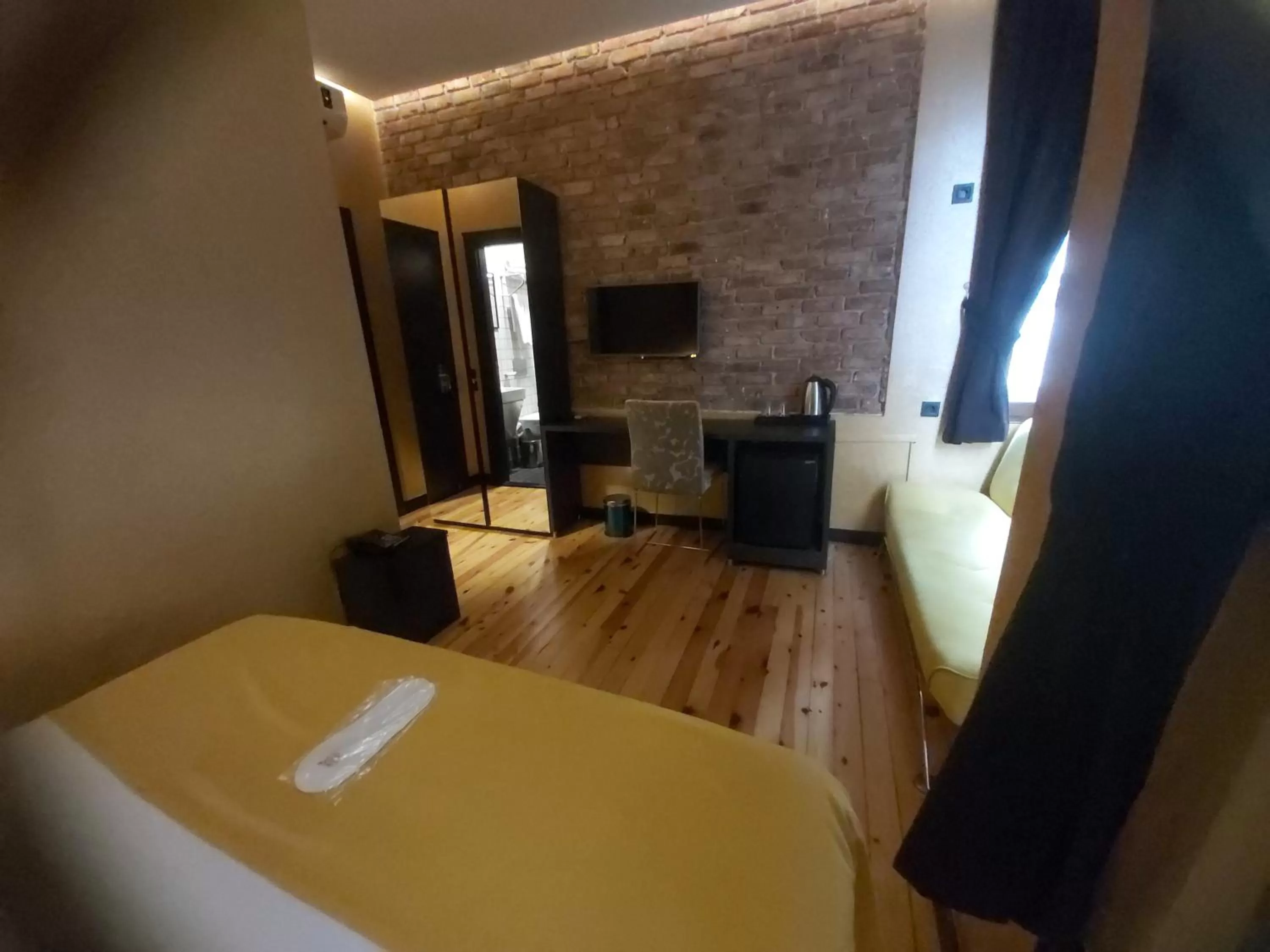 Photo of the whole room, TV/Entertainment Center in Taksim Terrace Hotel