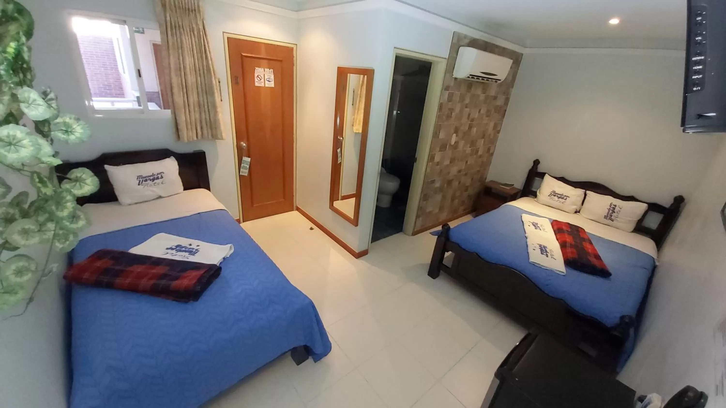 Bed in HOTEL MUEVETE POR VARGAS