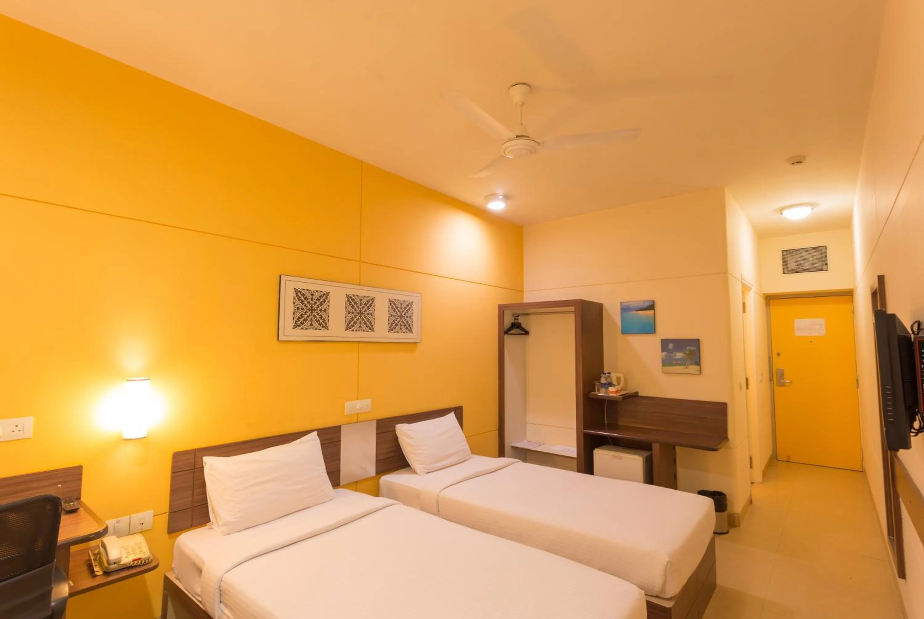 Photo of the whole room, Bed in Ginger Mangalore