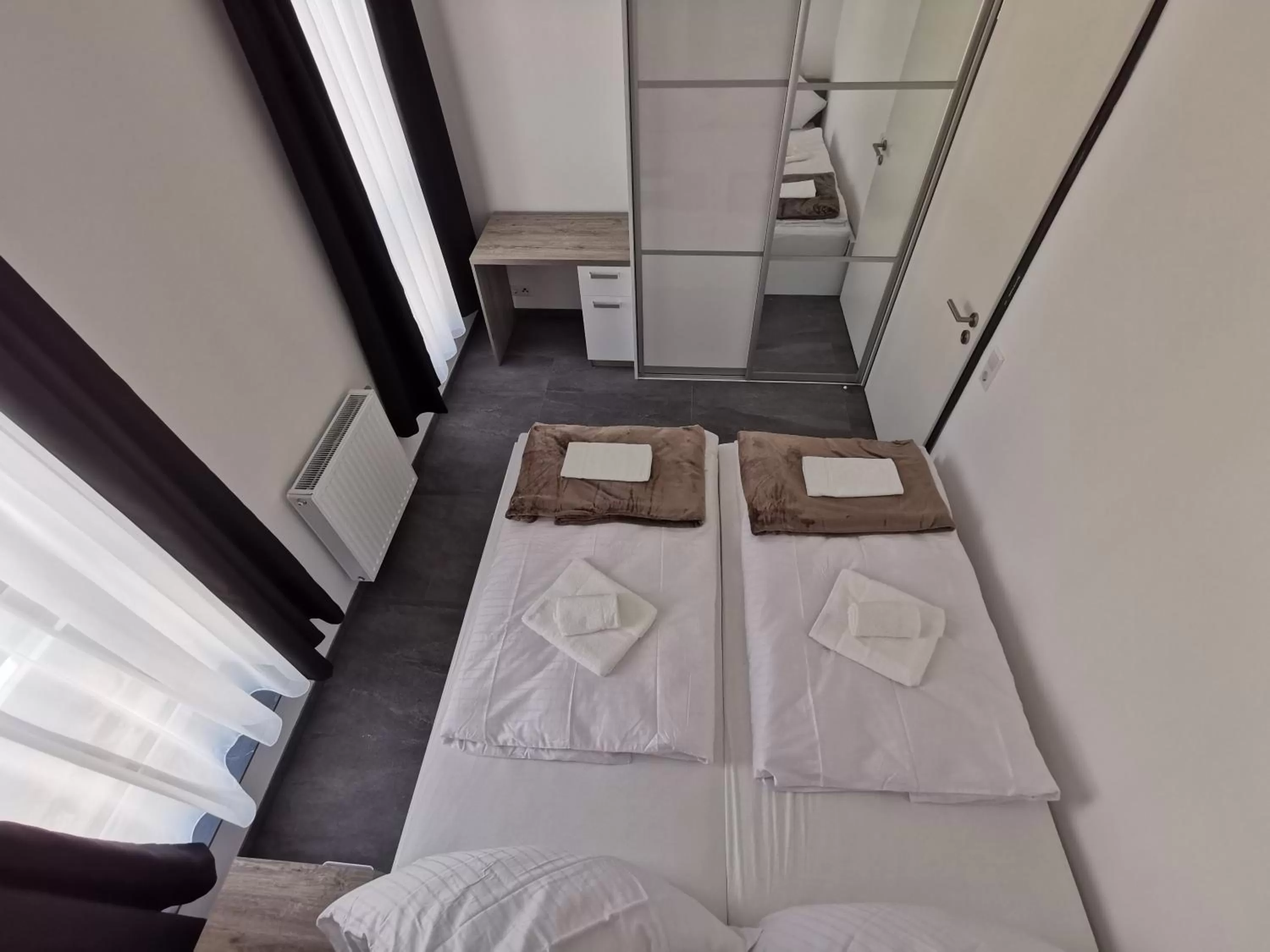 Bed in HP Apartments