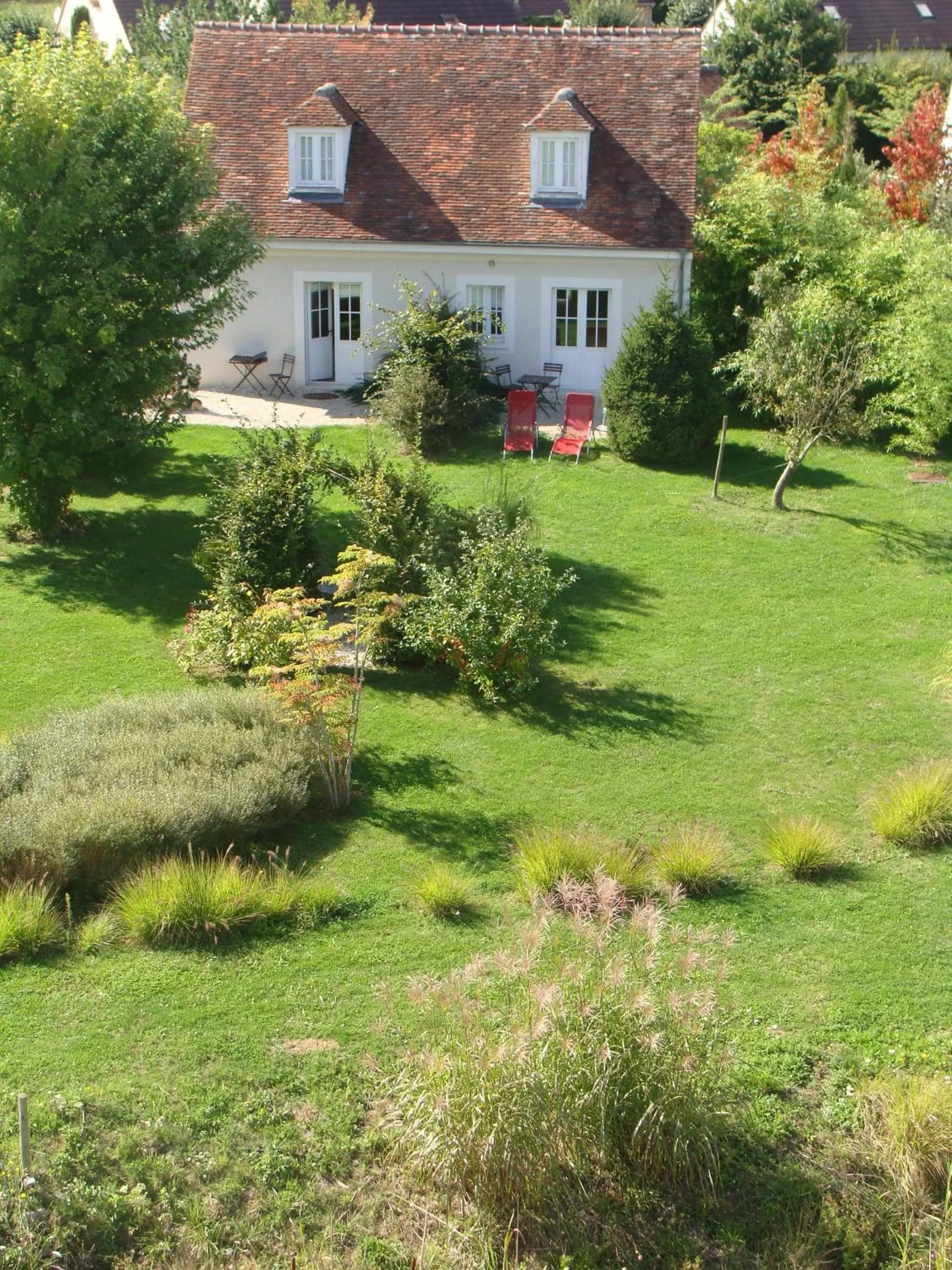 Garden view in Domaine de Bellevue, The Originals Relais