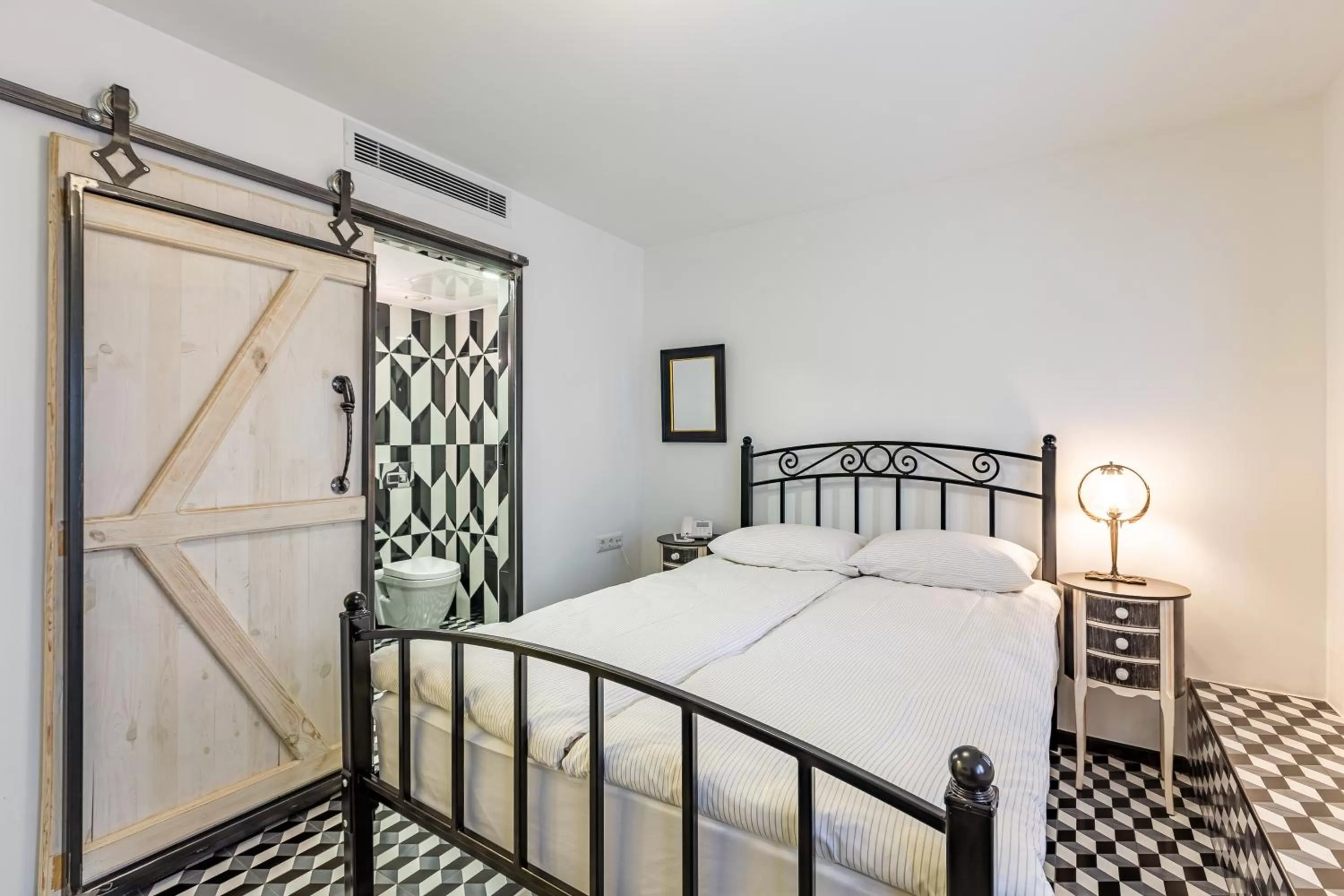 Bed in Villa Pera Suite Hotel